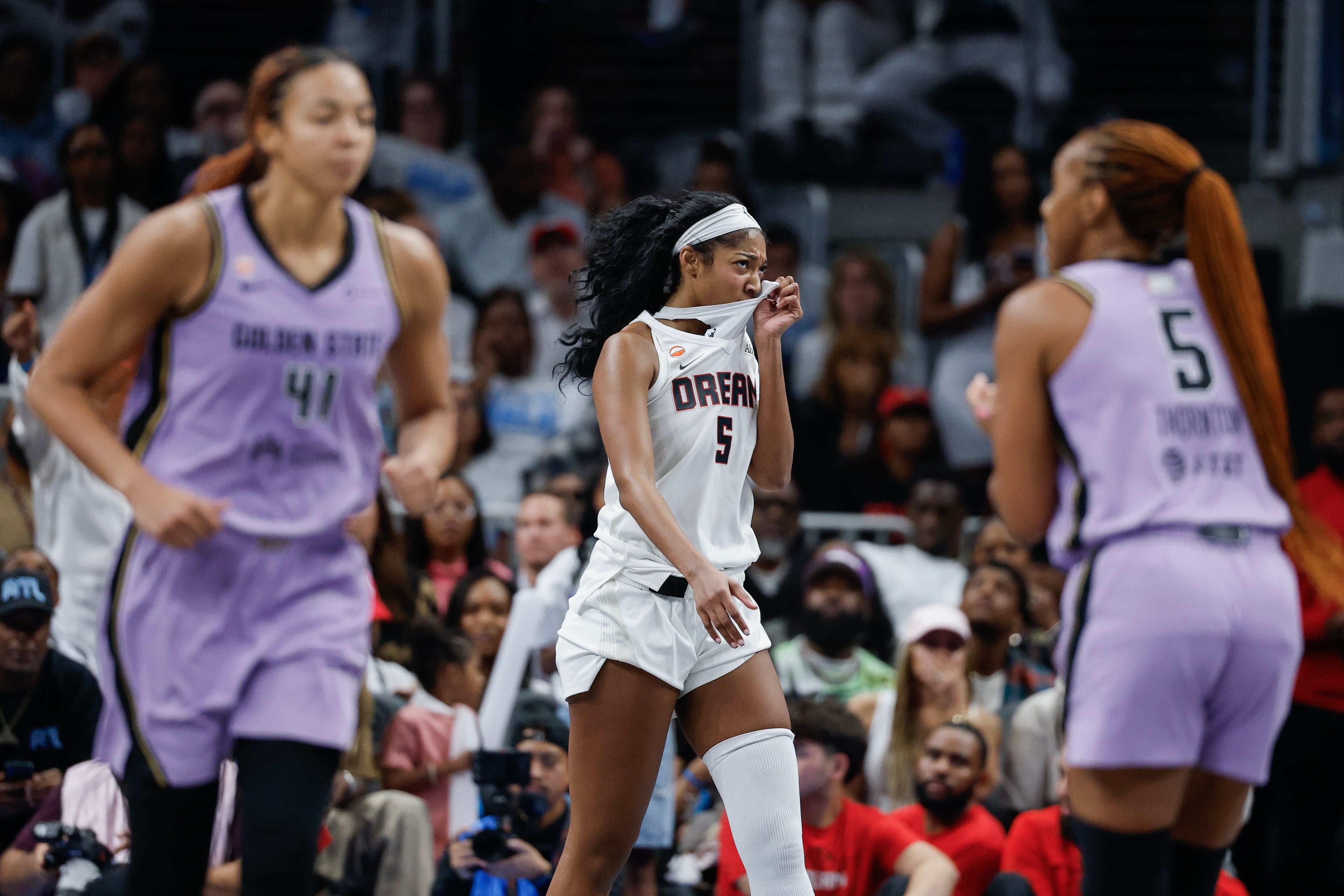 Atlanta Dream forward Angel Reese (center) reacts during the second half of Game 4 of the WNBA Finals between the Atlanta Dream and the Golden State Valkyries, Saturday, Oct. 24, 2026, in Atlanta. (Erik S. Lesser for the AJC)