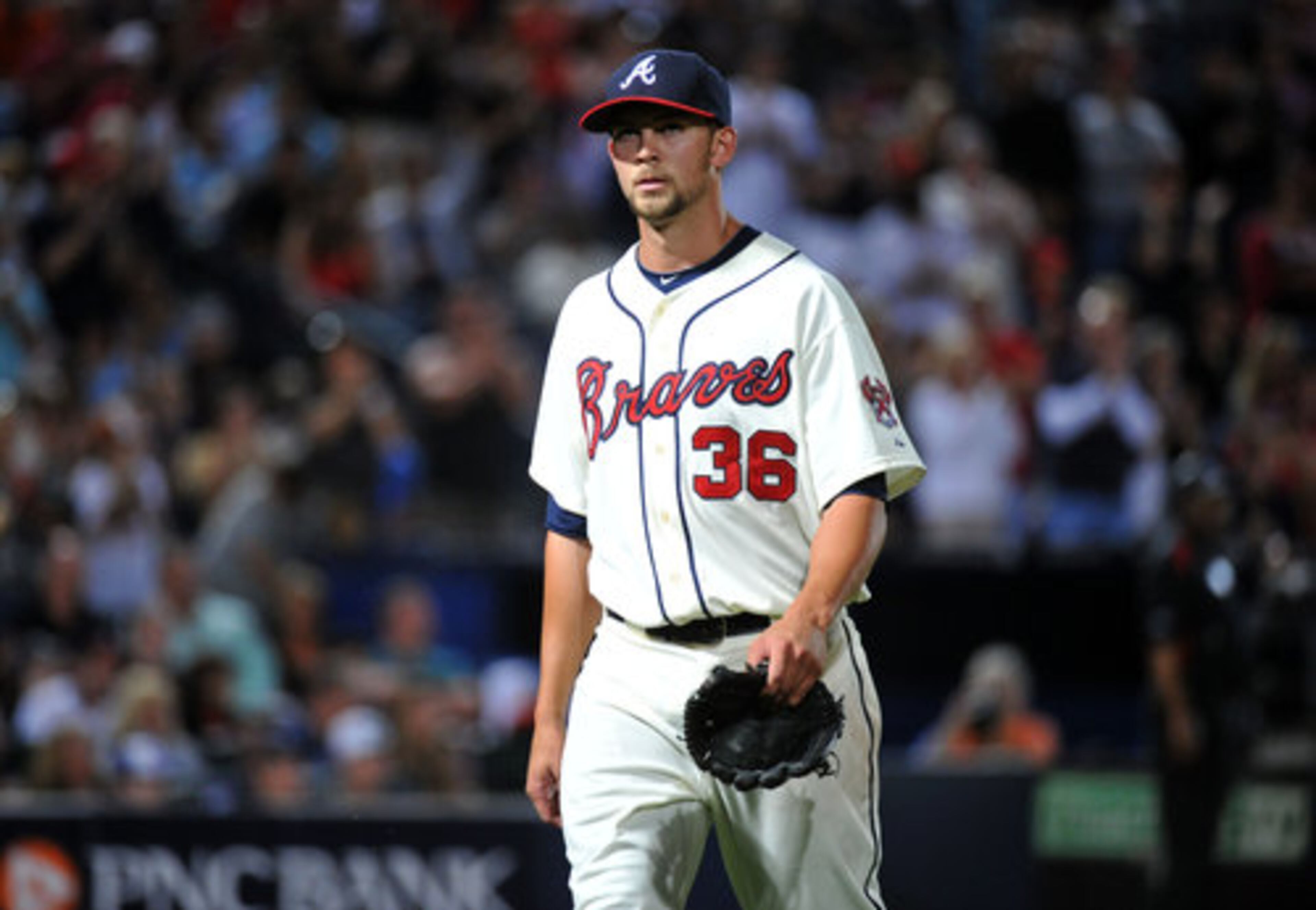 Atlanta Braves starting pitcher Mike Minor (36) walks off the field in the 8th inning at Turner Field in Atlanta on Saturday, April 14, 2012.