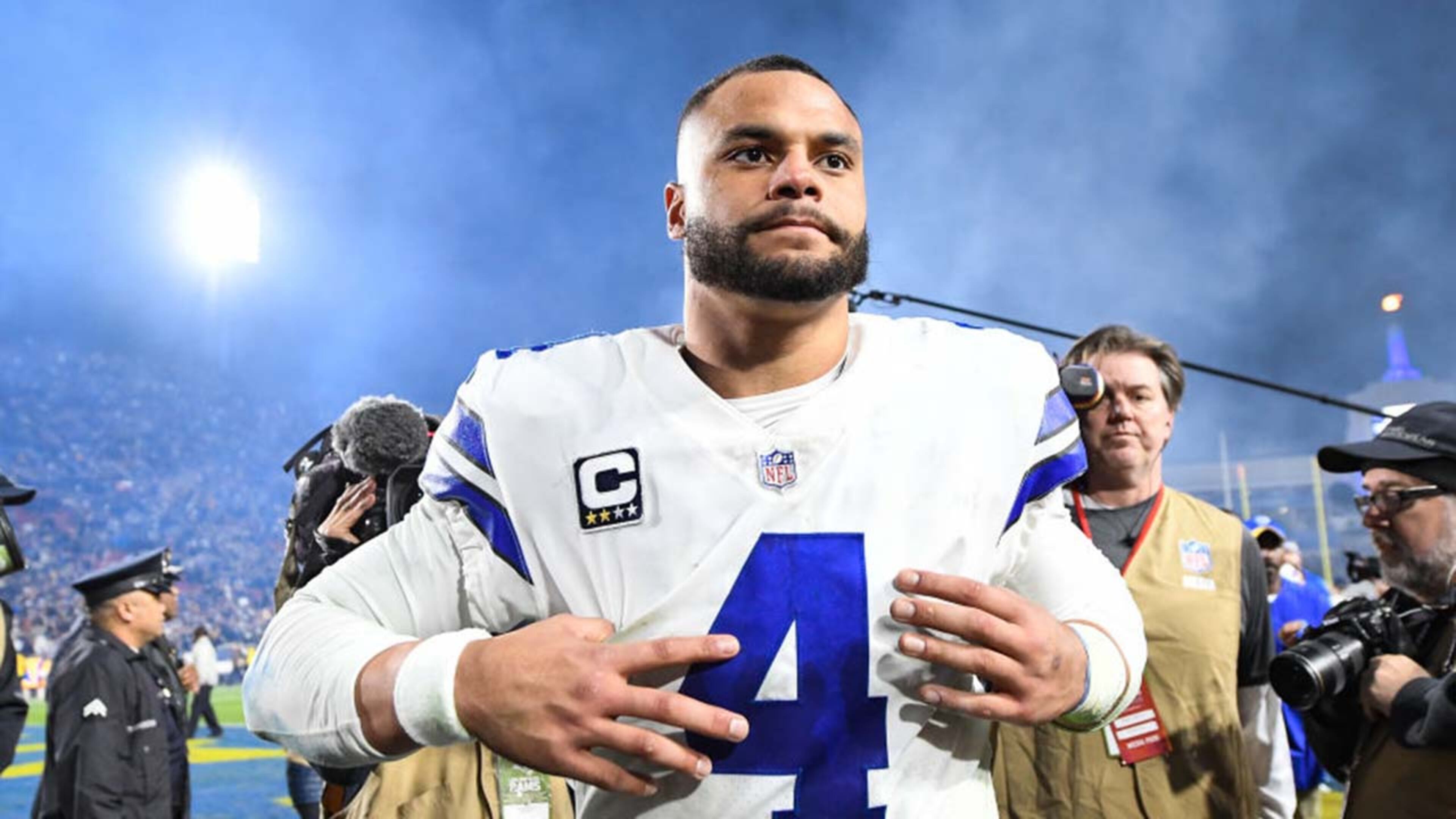 Quarterback Dak Prescott #4 of the Dallas Cowboys walks off the field after losing the NFC Divisional Round playoff game to the Los Angeles Rams at Los Angeles Memorial Coliseum on January 12, 2019 in Los Angeles, California.