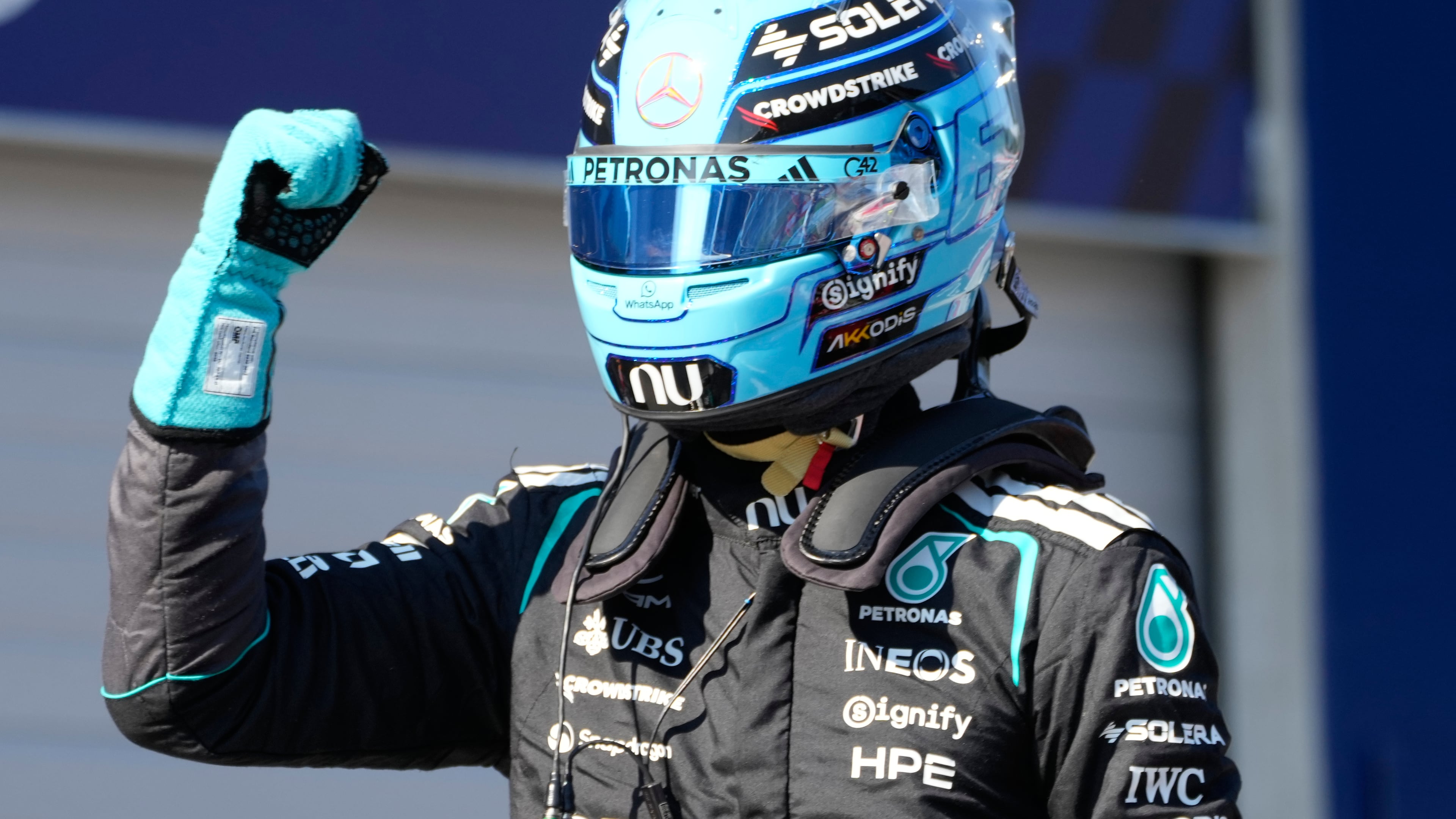 Mercedes driver George Russell of Britain celebrates after setting the pole position during the qualifying session ahead of the Austrian F1 Grand Prix, in Spielberg, Austria, Saturday, June 27, 2026. (AP Photo/Darko Bandic)