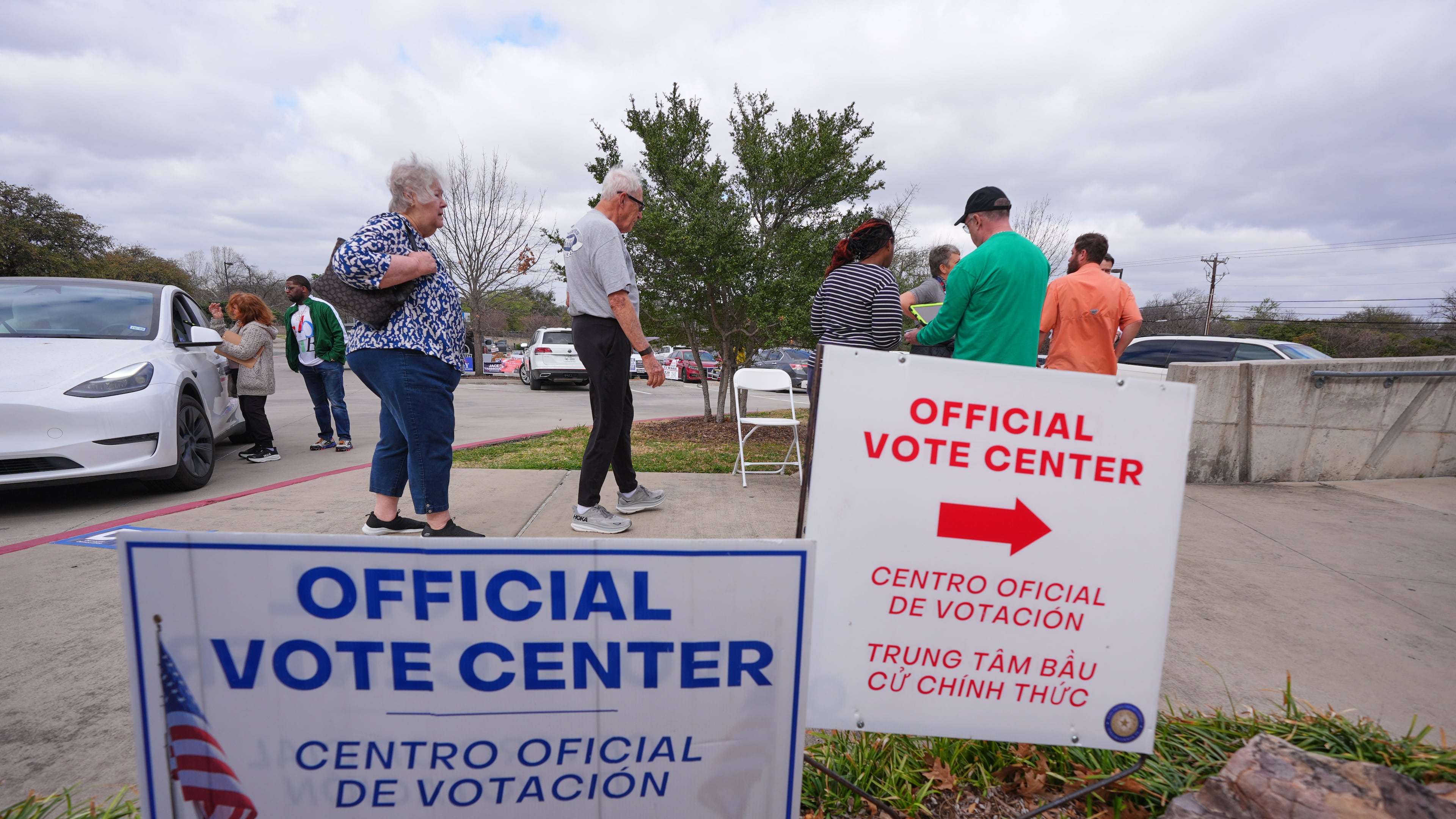 Primary voters arrive to cast ballots at an official vote center in Dallas, Tuesday, March 3, 2026. (AP Photo/LM Otero)