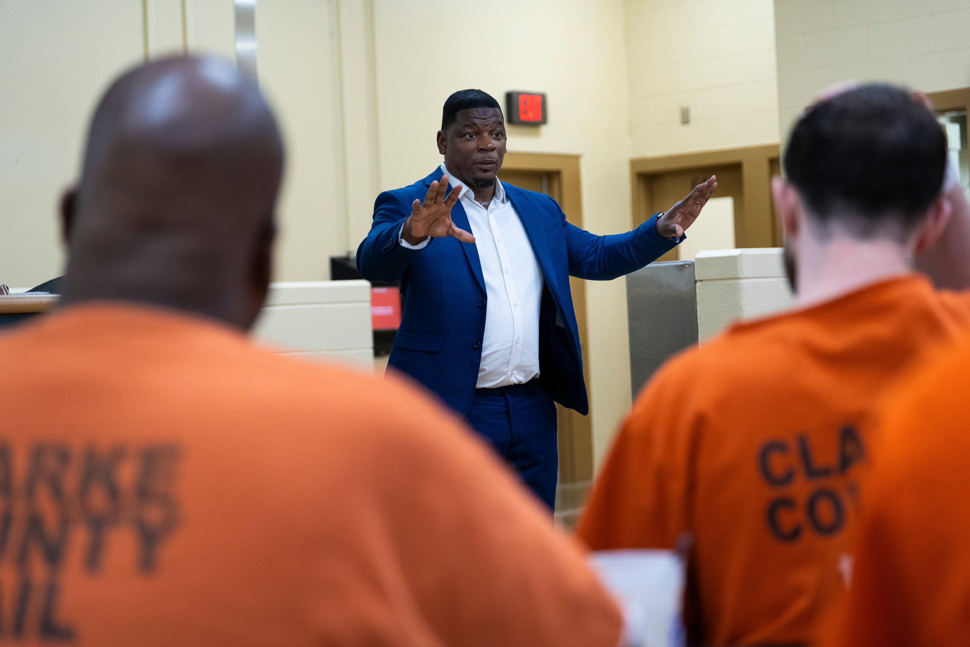 Shane Sims speaks to inmates at the Athens-Clarke County Jail on Wednesday, May 14, 2025. Decades ago, Sims sat where they sit — wearing the same uniform, eating the same food, feeling the same dread, sentenced to life. (Olivia Bowdoin for the AJC)
