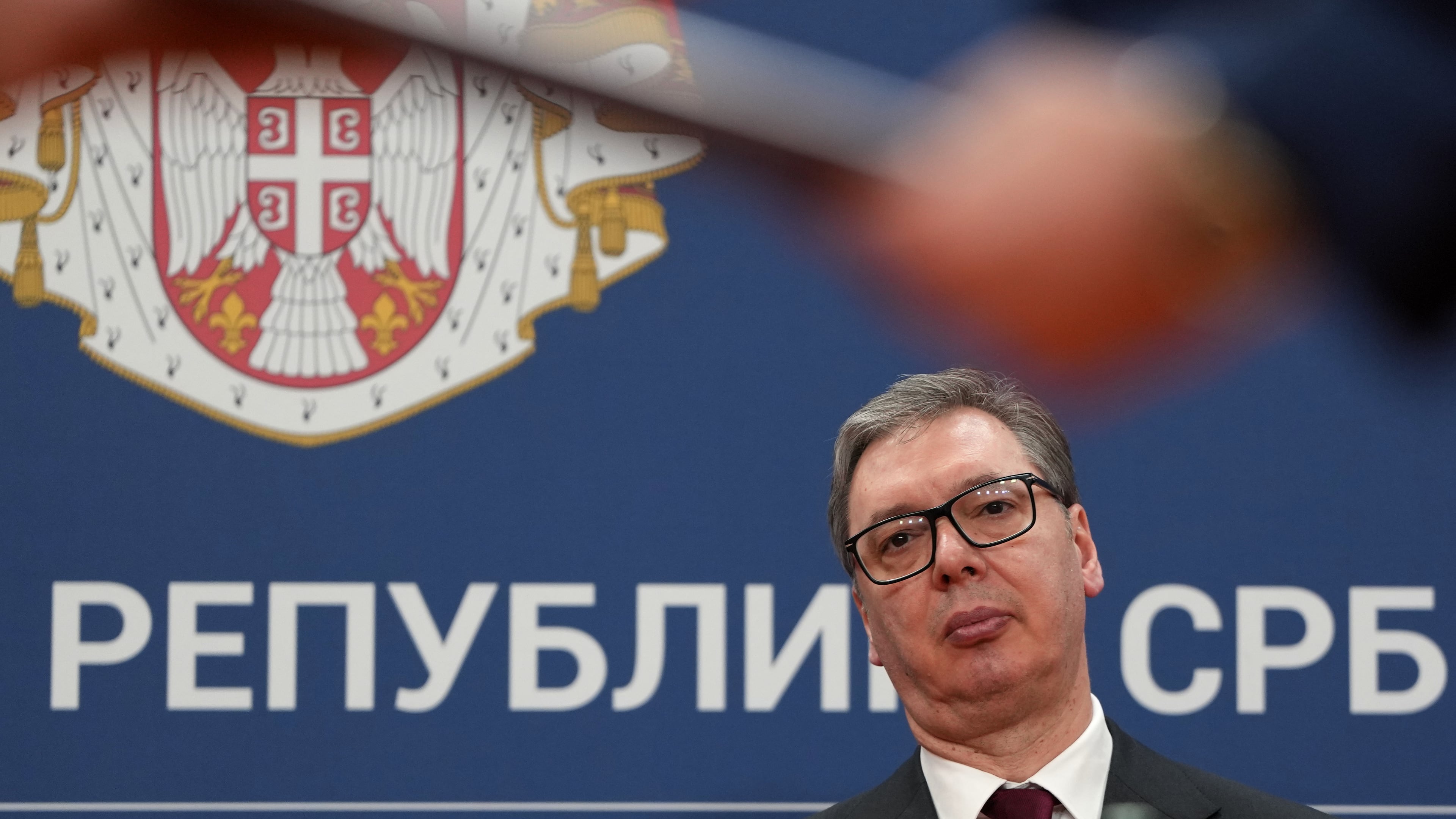 FILE - Serbian President Aleksandar Vucic looks on as documents are exchanged after the signing of an agreement following talks with Azerbaijan President Ilham Aliyev at the Serbia Palace in Belgrade, Serbia, Feb. 15, 2026. (AP Photo/Darko Vojinovic, File)