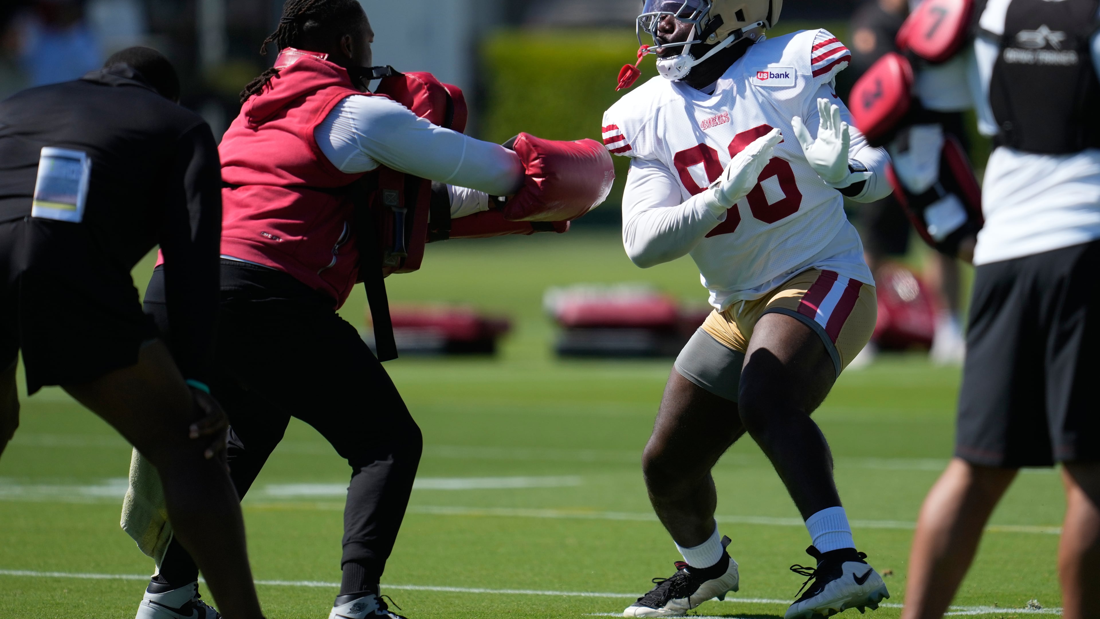 FILE - San Francisco 49ers' Cameron Sample, right, attends the NFL football team's training camp, July 31, 2026, in Santa Clara, Calif. (AP Photo/Jeff Chiu, File)