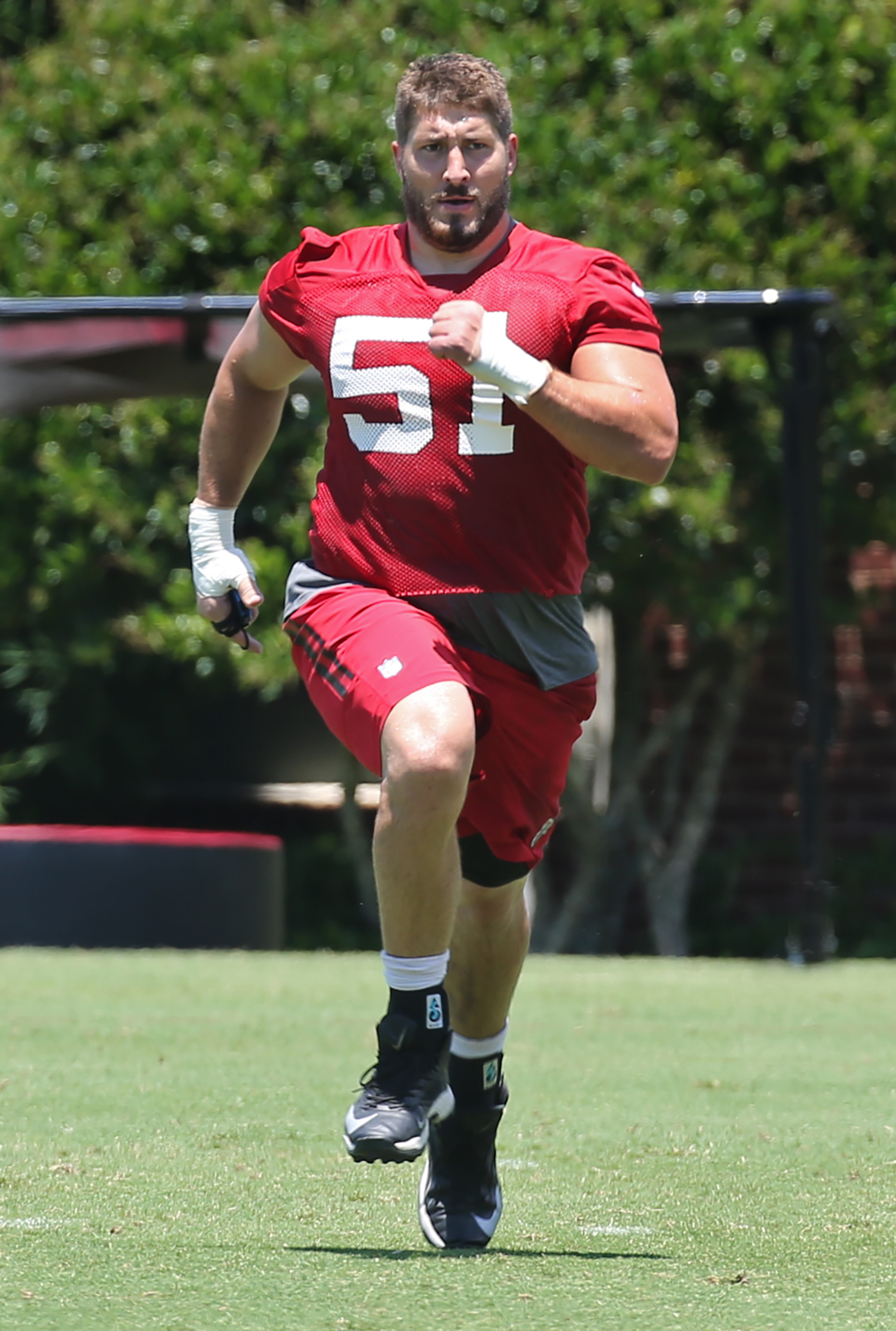 Falcons center Alex Mack runs sprints during an OTA day on Tuesday, June 7, 2016, in Flowery Branch. Curtis Compton / ccompton@ajc.com