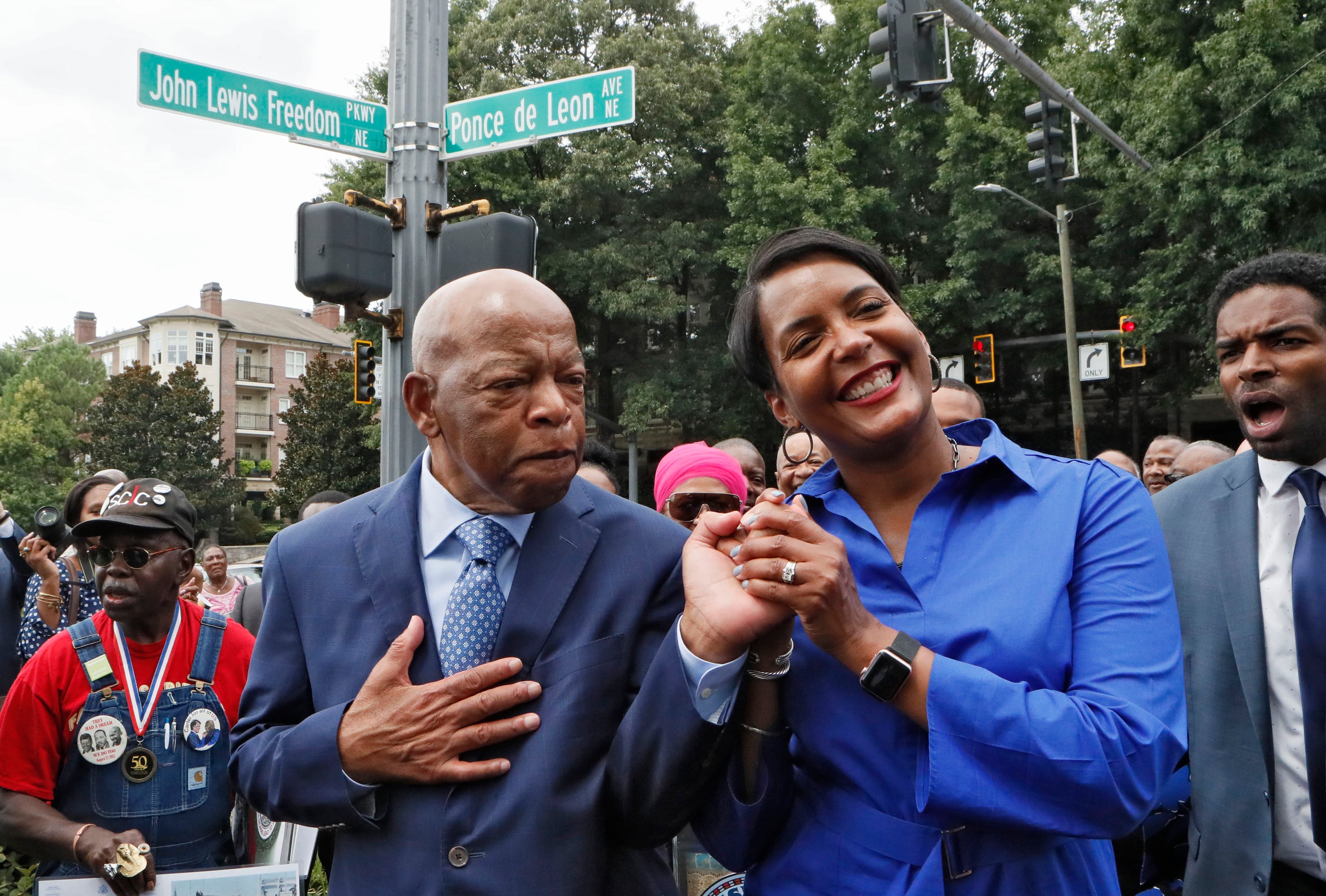8/22/18 - Atlanta - U.S. Rep. John Lewis and Mayor Keisha Lance Bottoms celebrate together after Freedom Parkway was renamed "John Lewis Freedom Parkway" during a dedication ceremony and sign unveiling and the Freedom Riders play space was dedicated. BOB ANDRES /BANDRES@AJC.COM