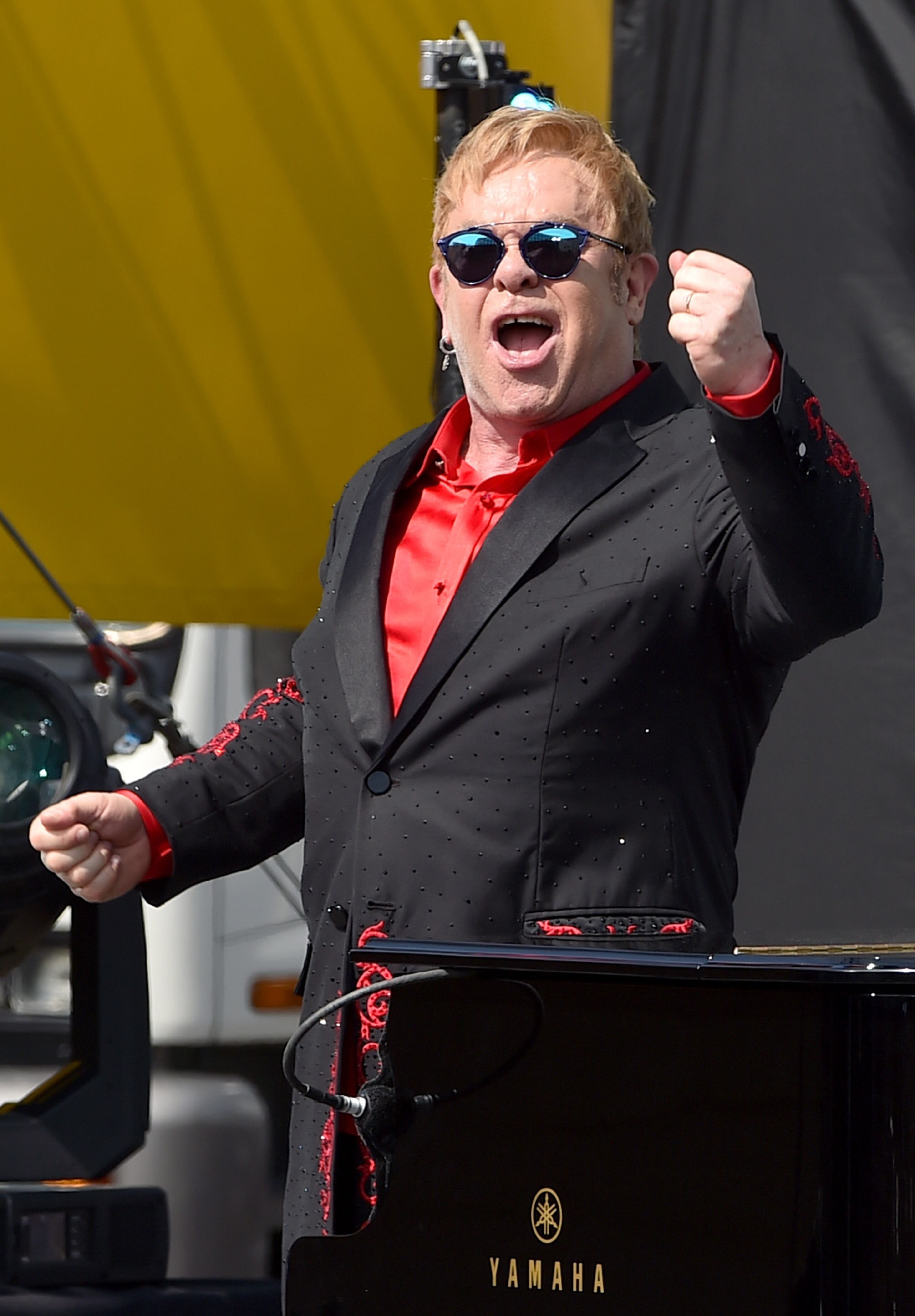 WEST HOLLYWOOD, CA - FEBRUARY 27: Elton John performs live on the Sunset Strip, on February 27, 2016, as a thank you to the City of West Hollywood for their support of the Elton John AIDS Foundation. The concert was streamed live on AOL.com and co-presented by AOL and BBVA. (Photo by Kevin Winter/Getty Images for AOL)