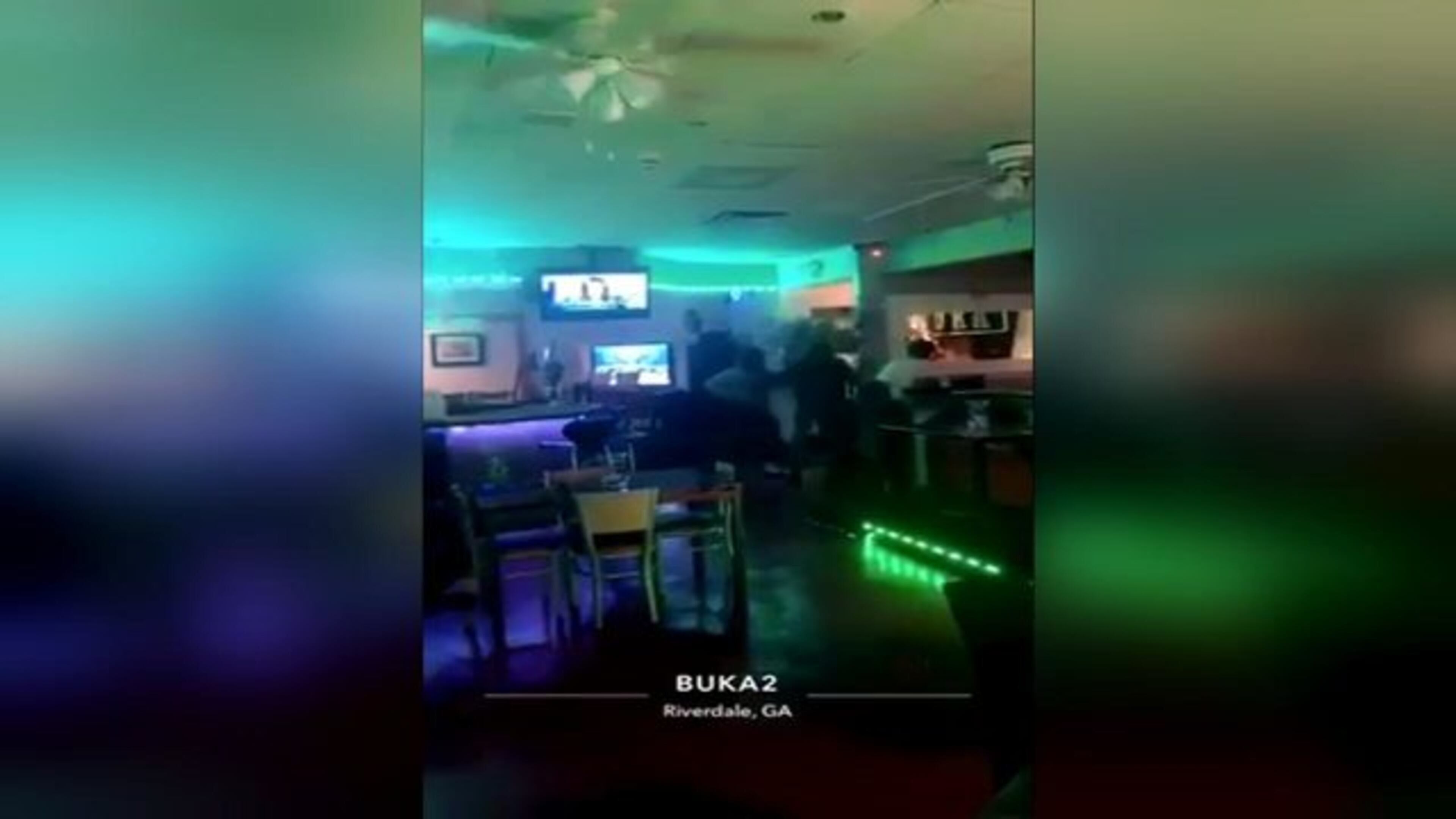 A customer at a Riverdale restaurant says the manager's son pulled a gun on her and her friends.