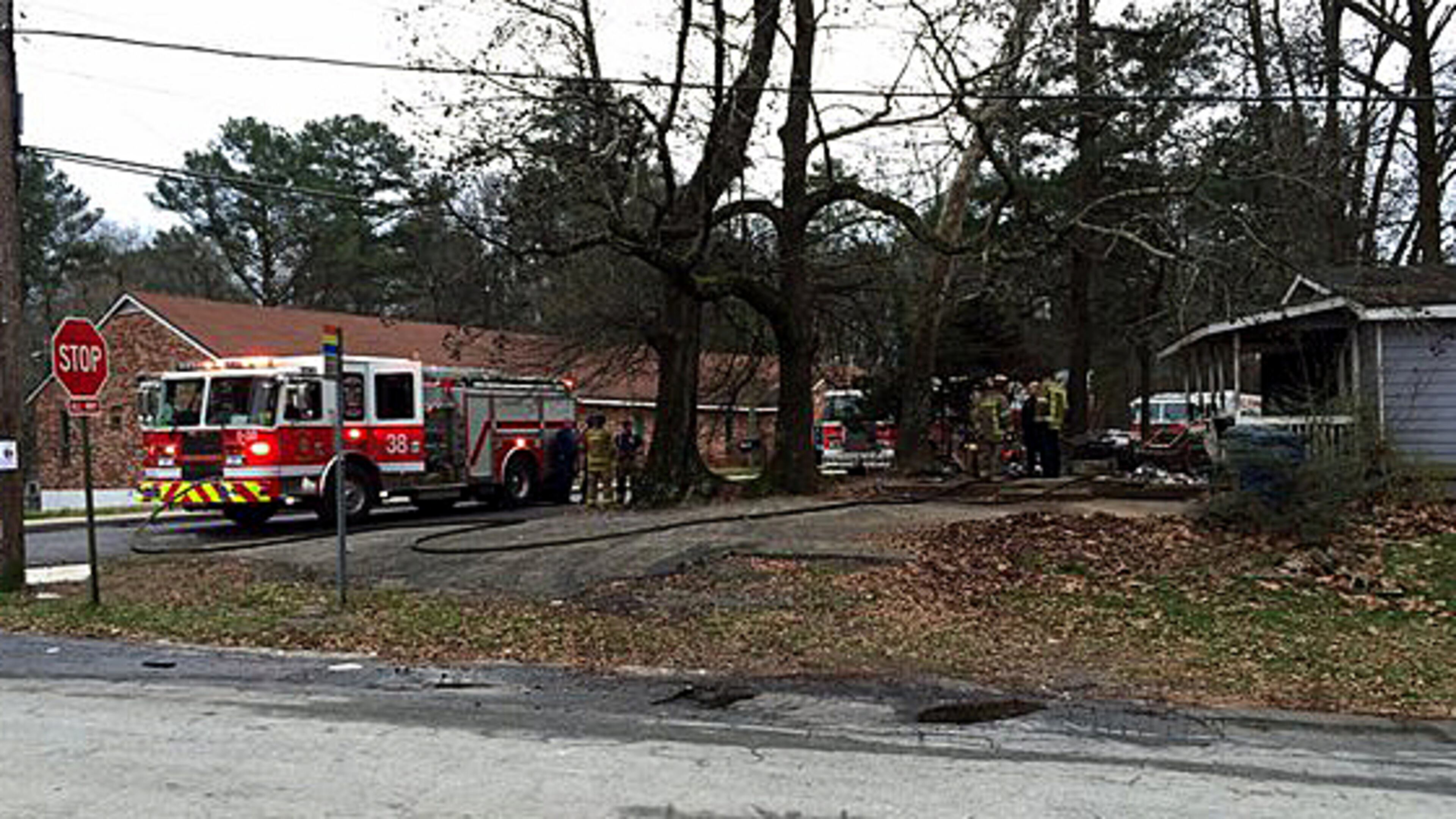 A 68-year-old woman died Friday in a house fire on Hightower Road. (Photo: Channel 2 Action News)