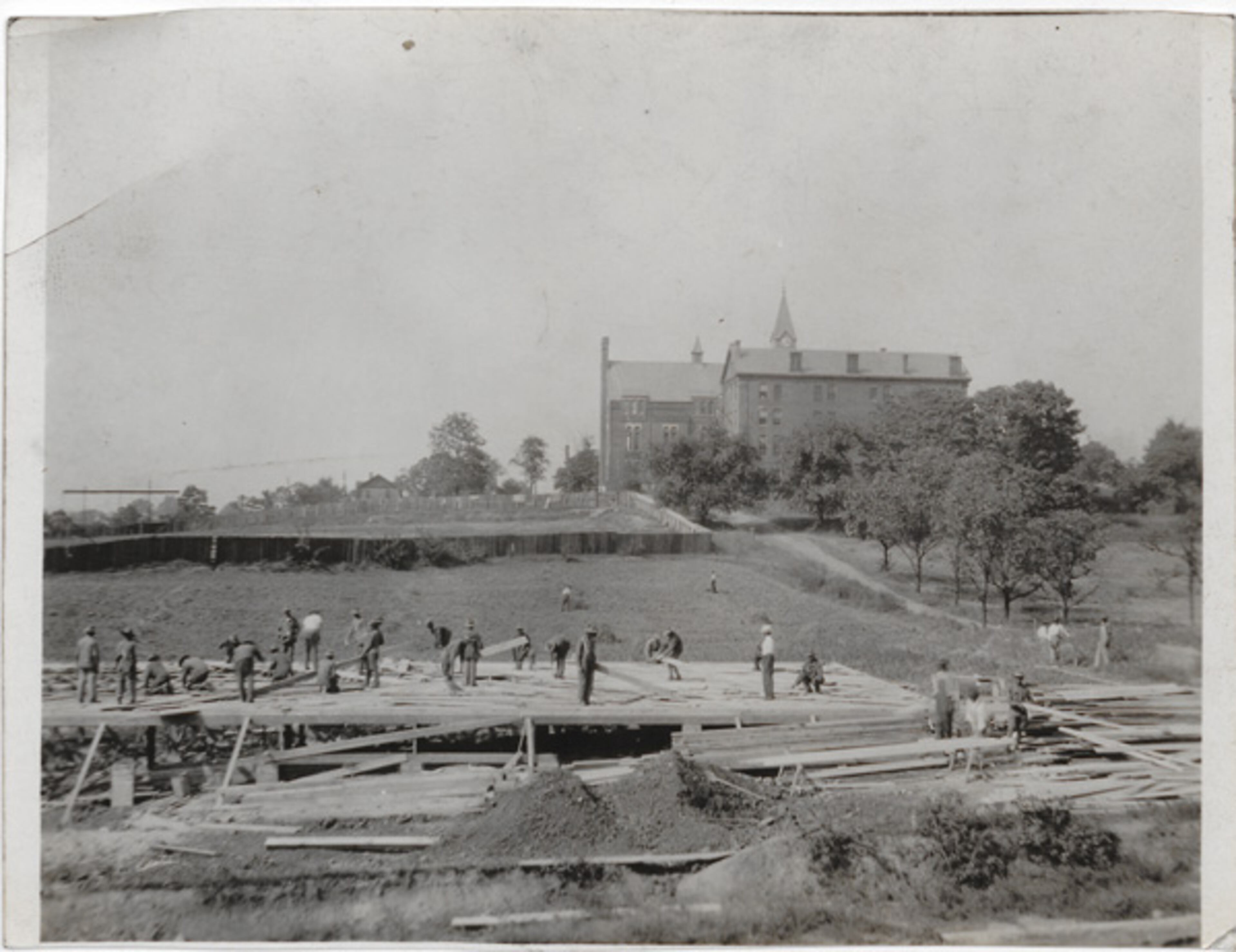 Soldier carpenters begin building their barracks from the ground up on the lovely Atlanta University campus.