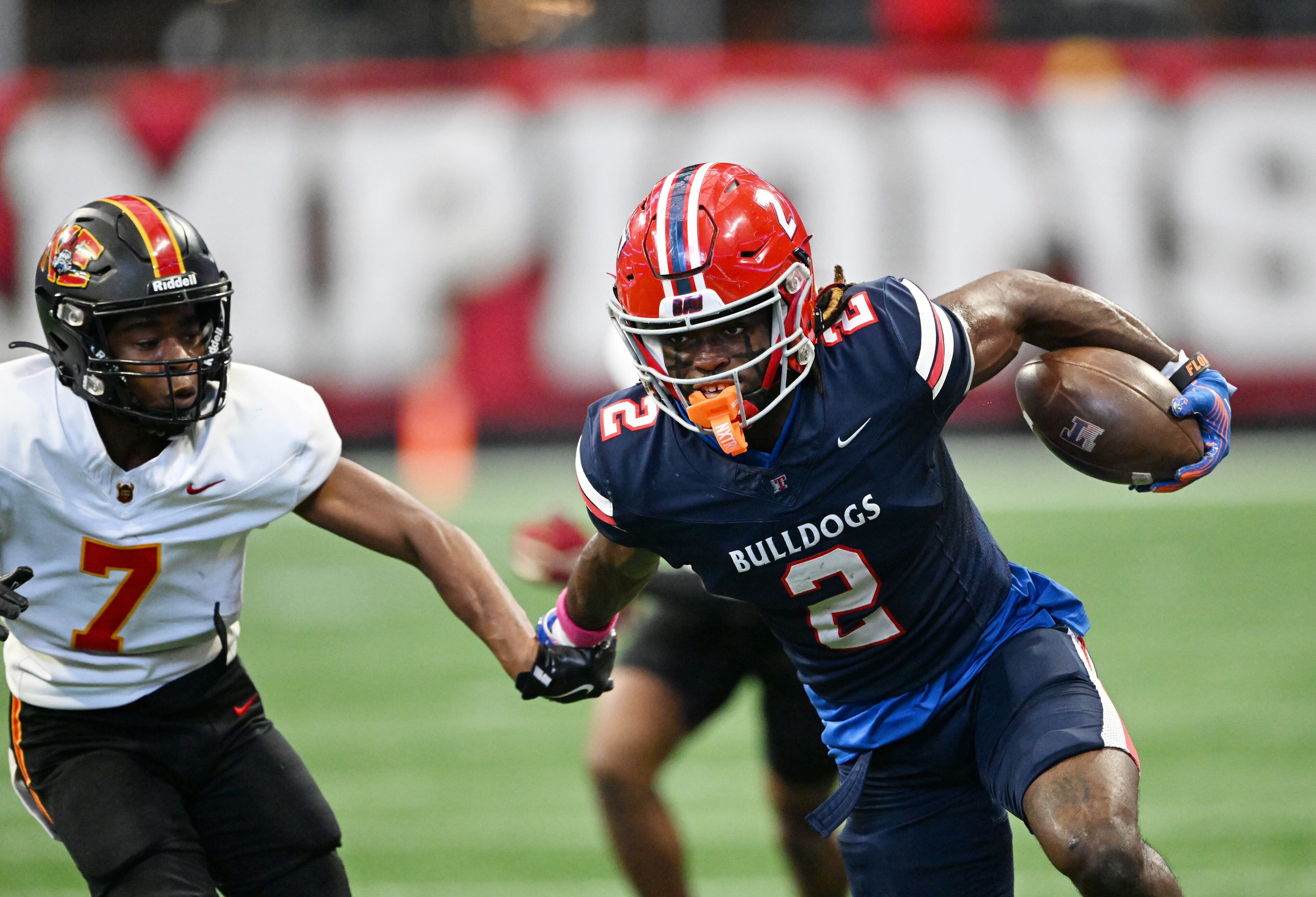 Toombs County's wide receiver Lagonza Hayward (2) runs for a touchdown during the first half in GHSA Class A-Division State Championship game at Mercedes-Benz Stadium, Tuesday, December 17, 2024, in Atlanta. (Hyosub Shin / AJC)
