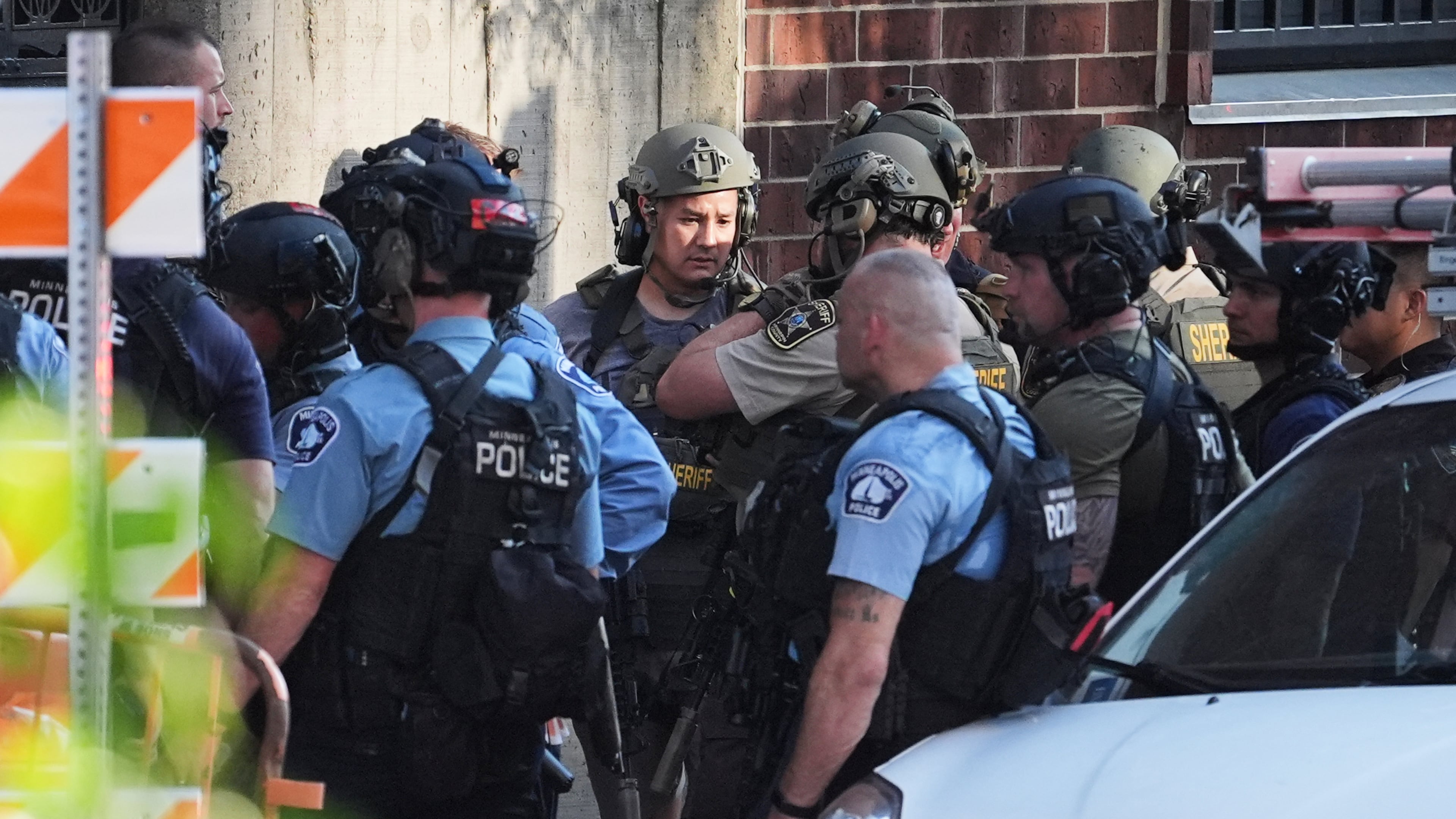 Law enforcement respond to a shooting Wednesday, Sept. 2, 2026, in downtown Minneapolis. (AP Photo/Ellen Schmidt)