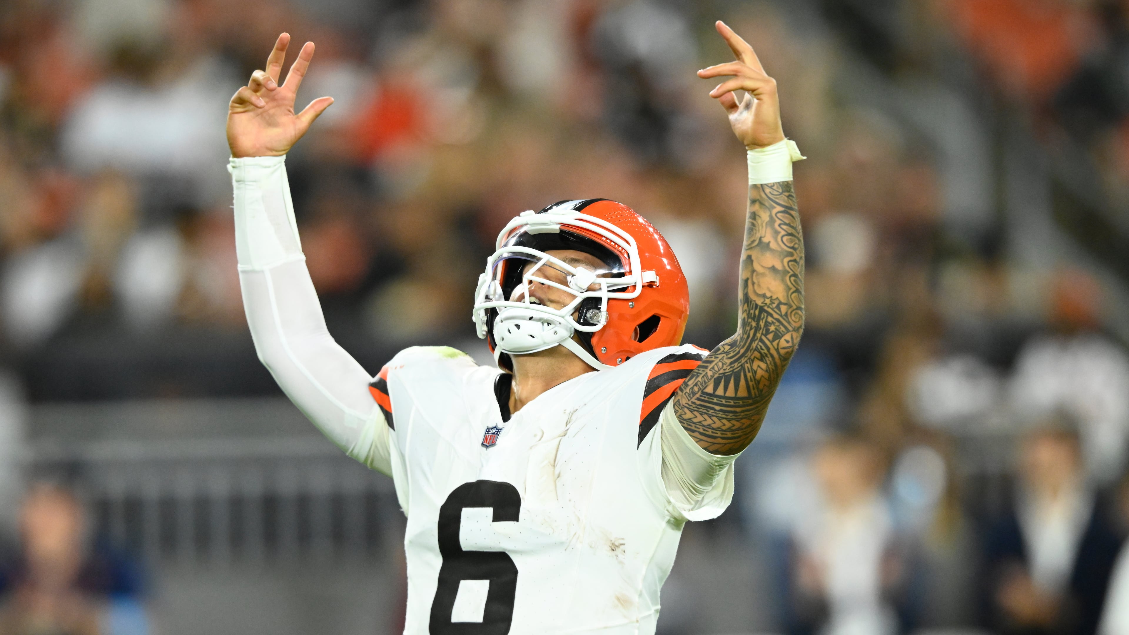 Cleveland Browns quarterback Dillion Gabriel celebrates after throwing a touchdown pass against the New England Patriots during the first half of a preseason NFL football game Thursday, Aug. 27, 2026, in Cleveland. (AP Photo/David Richard)