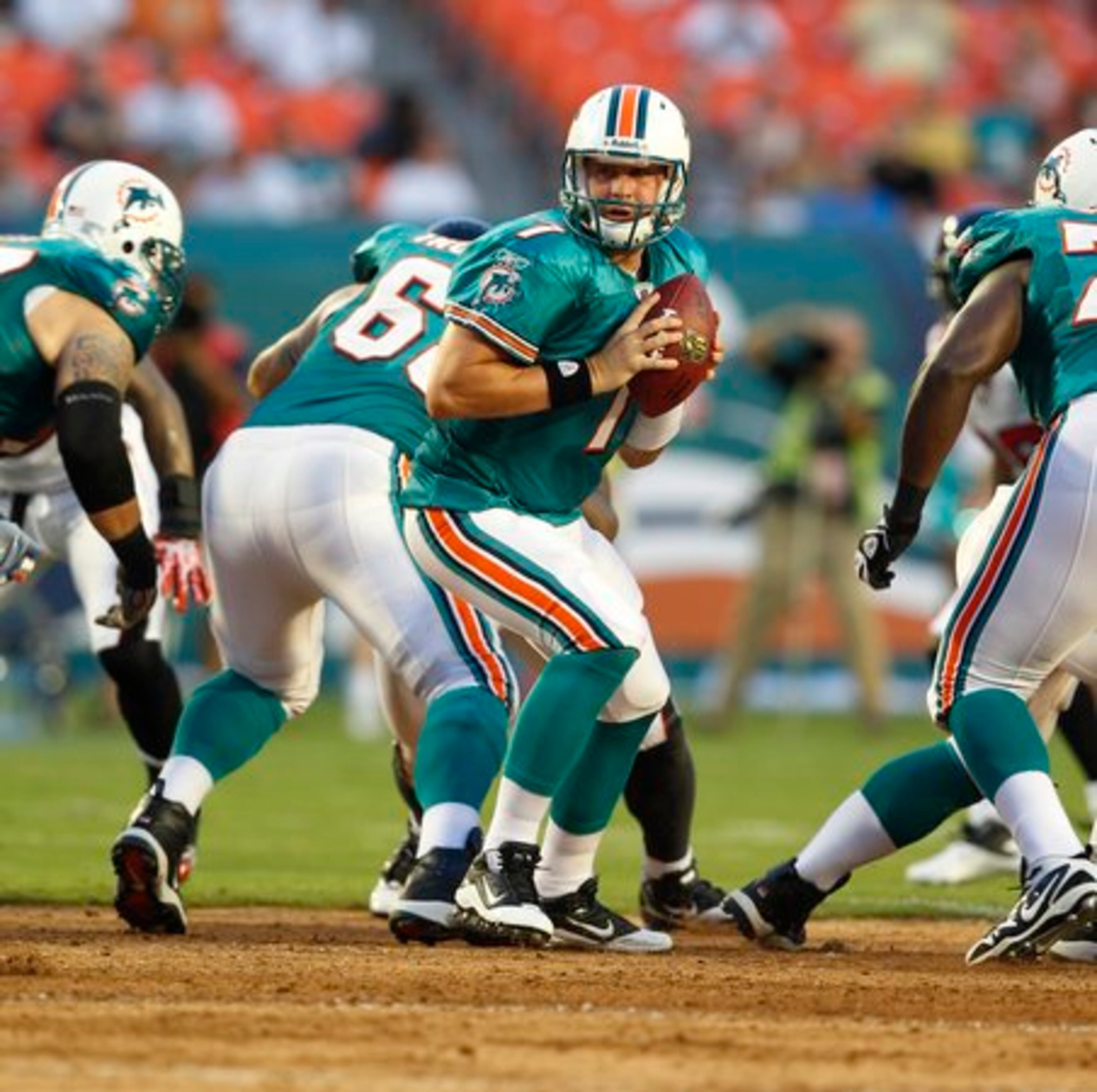 Miami Dolphins quarterback Chad Henne (7) runs a play against the Atlanta Falcons during first quarter NFL preseason football action in Miami, Friday, Aug. 27, 2010.