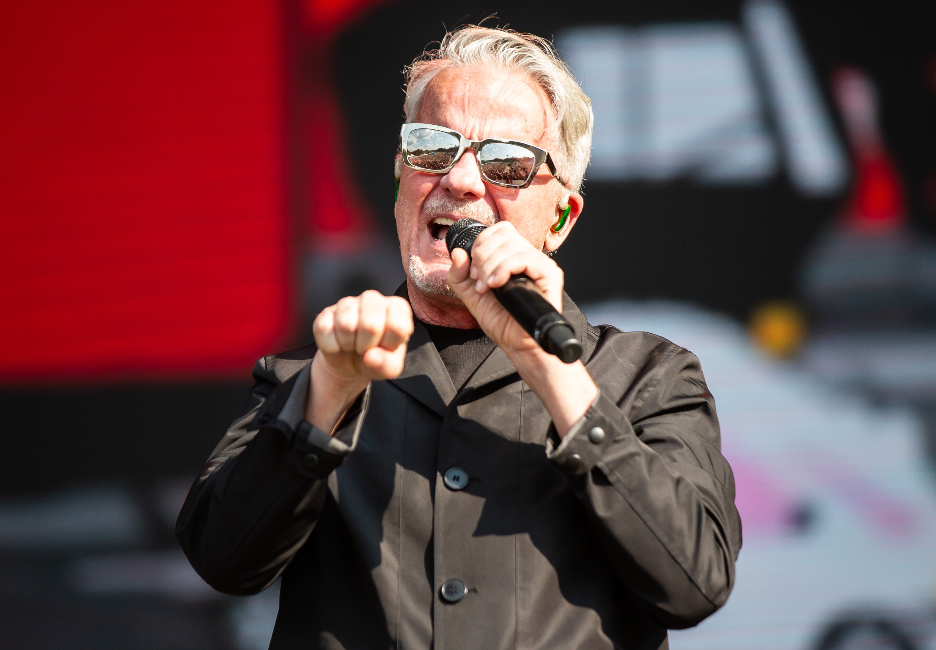 Atlanta, Ga. — New wave legends Devo took the Peachtree Stage and played classics like "Whip It" for adoring fans on Sunday, Sept. 21, 2025, at Piedmont Park. (RYAN FLEISHER FOR THE ATLANTA JOURNAL-CONSTITUTION)