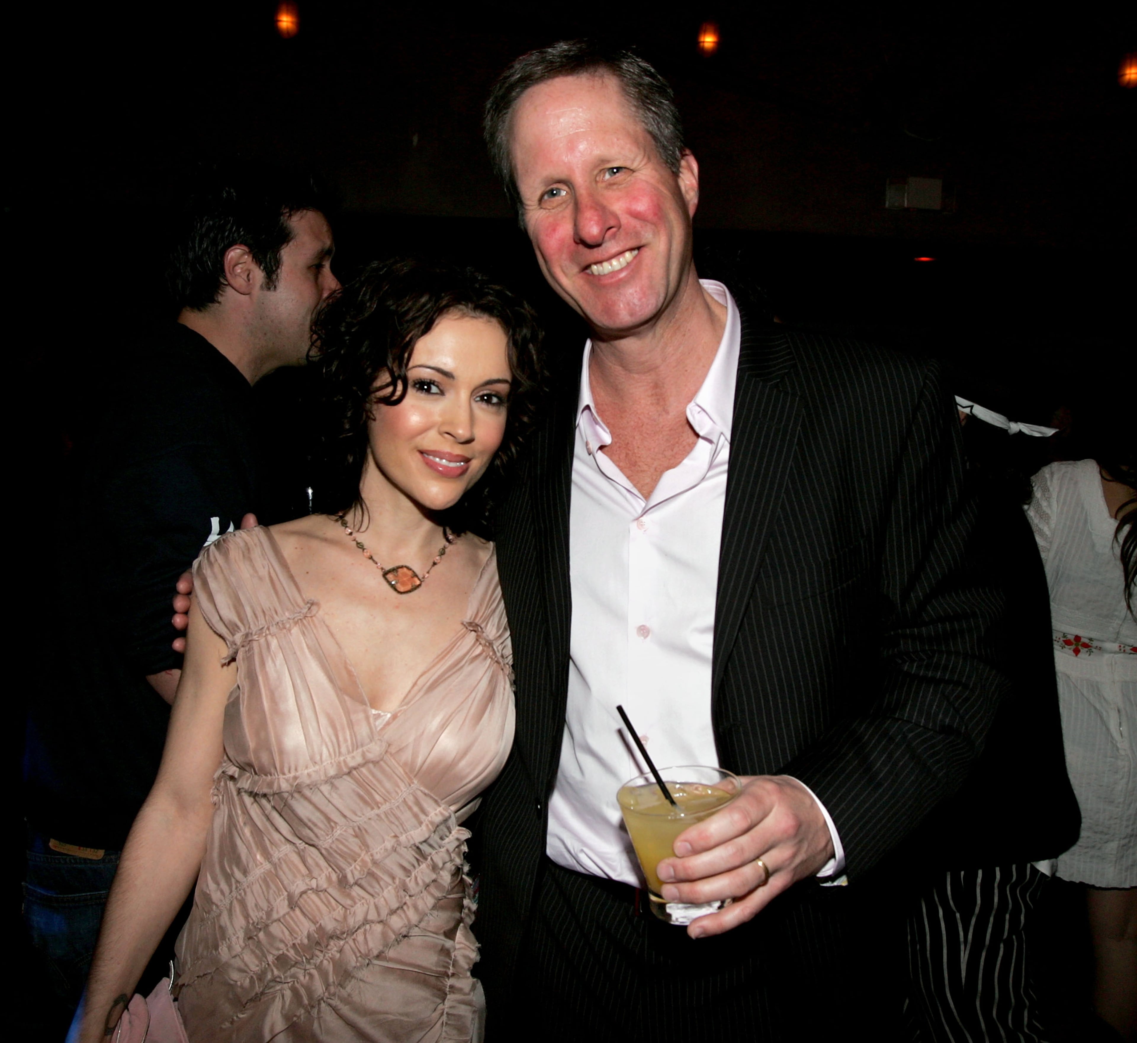 Actress Alyssa Milano and Publisher of Entertainment Weekly Tom Morrissy attend Usher's Private Grammy Party hosted by Entertainment Weekly held at the Geisha House on February 13, 2005 in Hollywood, California. (Photo by Mark Mainz/Getty Images)