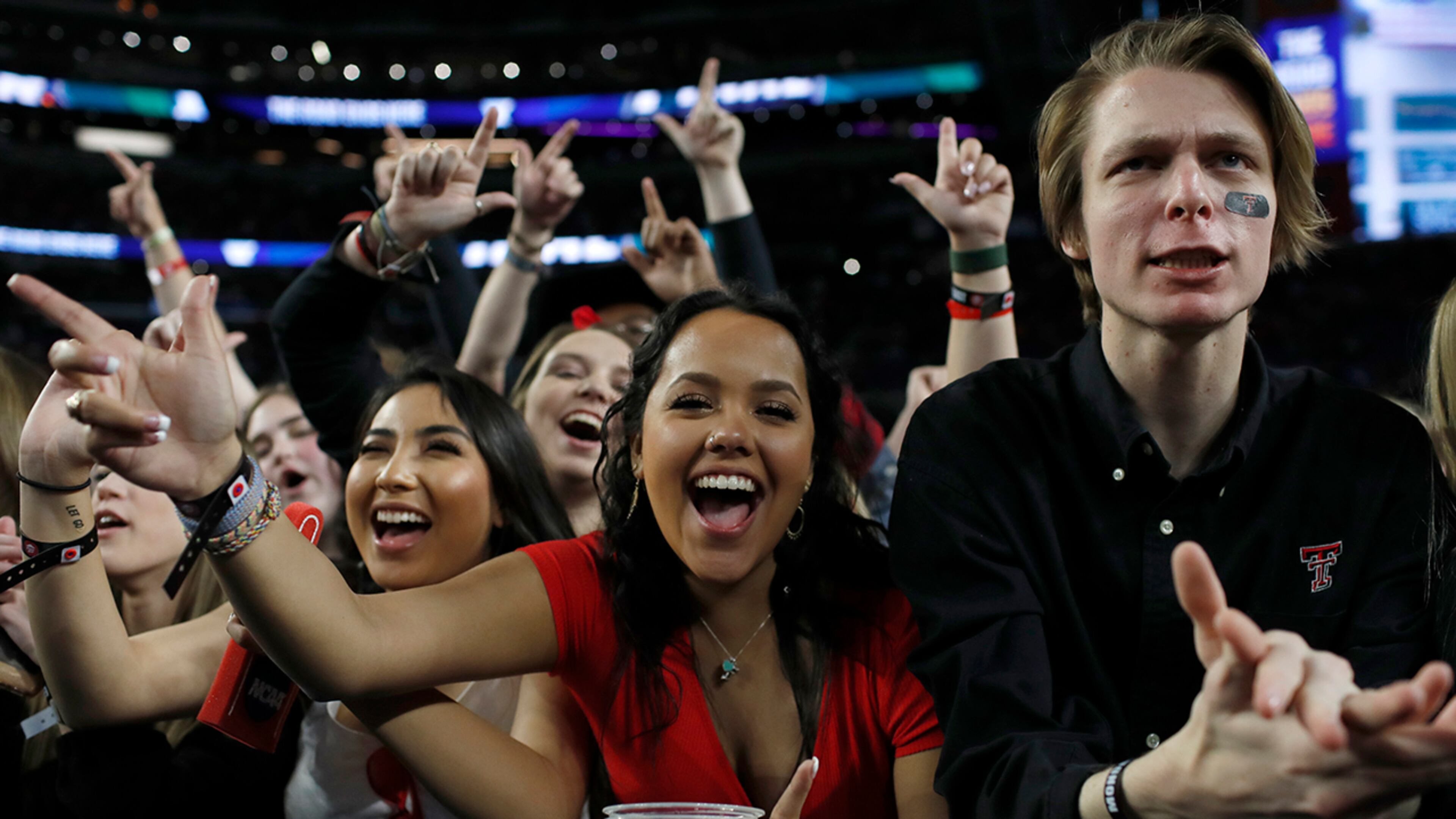 Texas Tech fans cheer before the championship of the Final Four NCAA college basketball tournament between Texas Tech and Virginia, Monday, April 8, 2019, in Minneapolis. (AP Photo/Jeff Roberson)