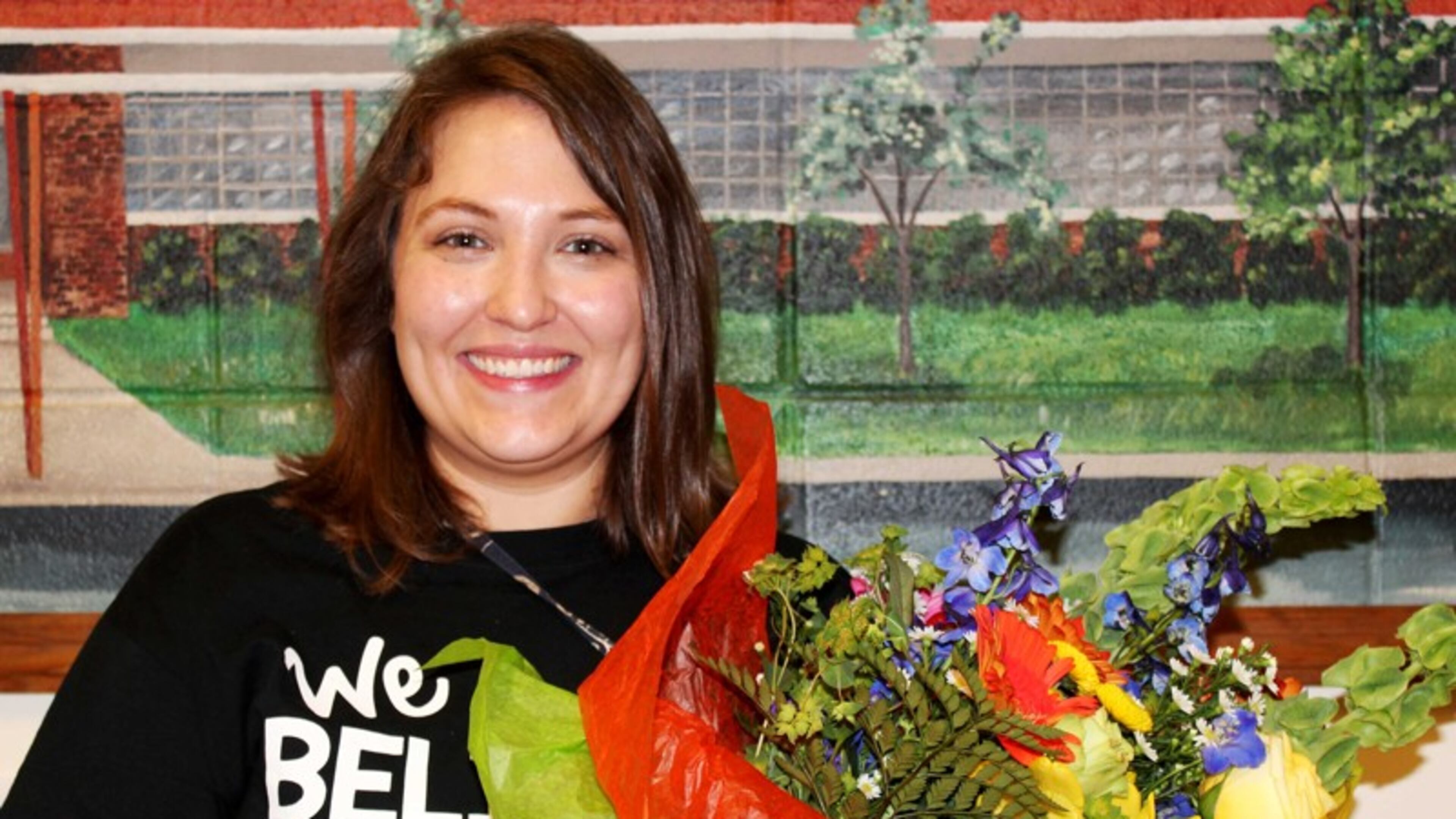 Teacher Elizabeth Dunlap of Fair Oaks Elementary posing when she was named the district's elementary school teacher of the year for 2016-17.