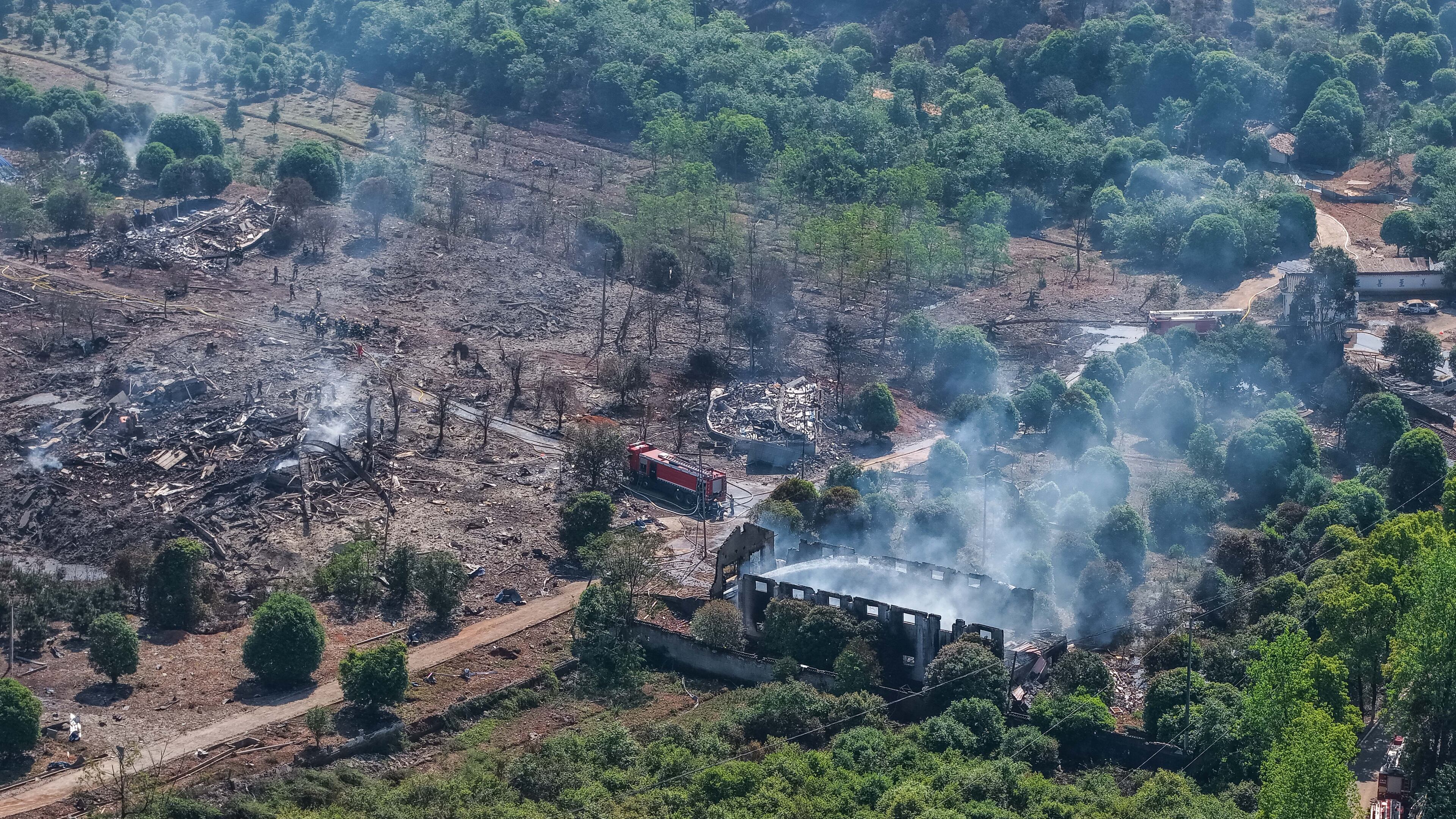 This photo released by Xinhua News Agency, this aerial drone photo taken May 5, 2026 shows rescuers working on site after an explosion at a fireworks plant in Guandu Town of Liuyang, central China's Hunan Province. (Chen Sihan/Xinhua via AP)