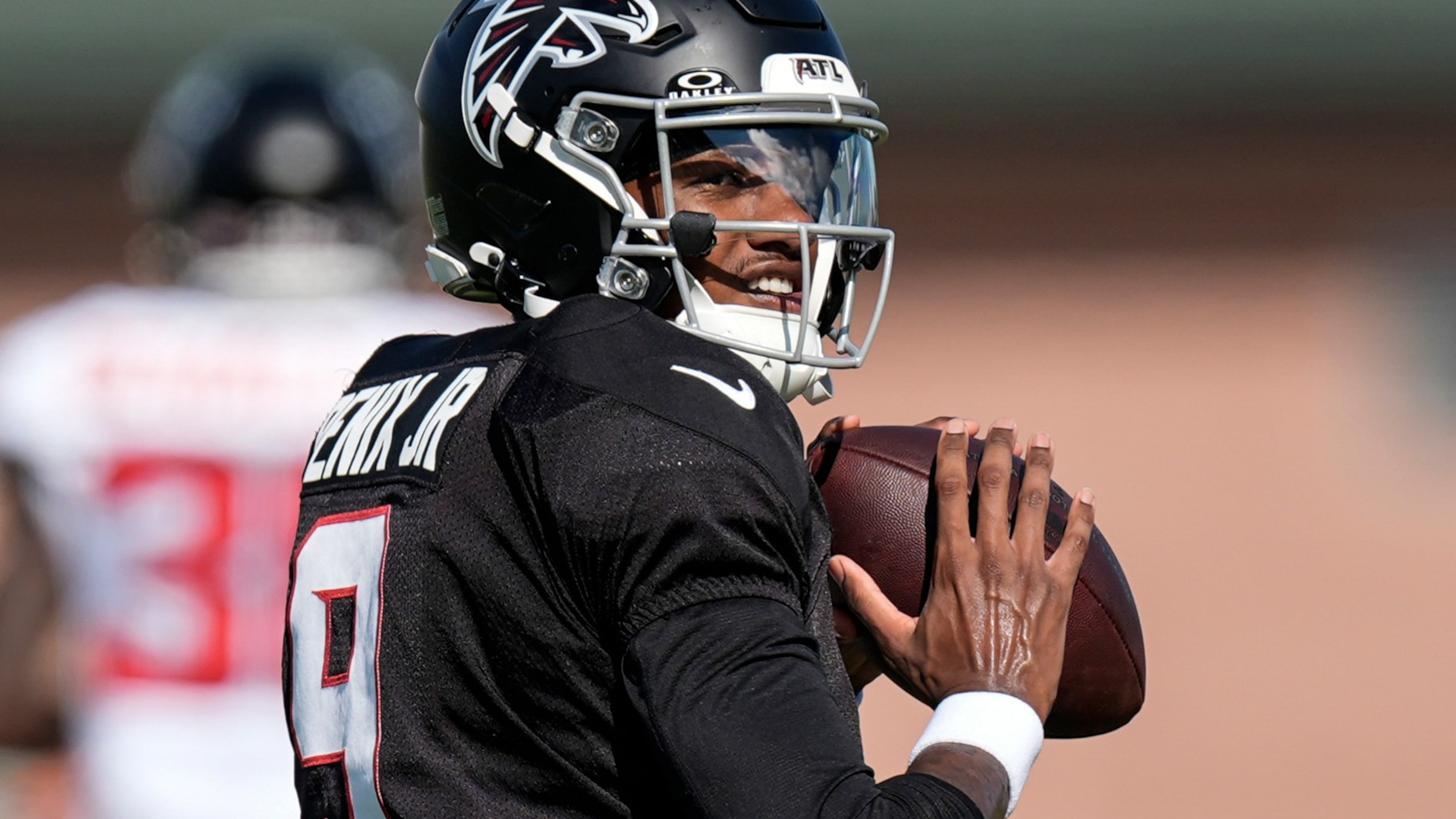 Falcons quarterback Michael Penix Jr. works out during training camp Monday, Aug. 3, 2026, in Flowery Branch. Penix has not been cleared for 11-on-11 sessions after knee surgery and said his doctor set the timeline at four weeks until he’d be fully cleared. (Mike Stewart/AP)