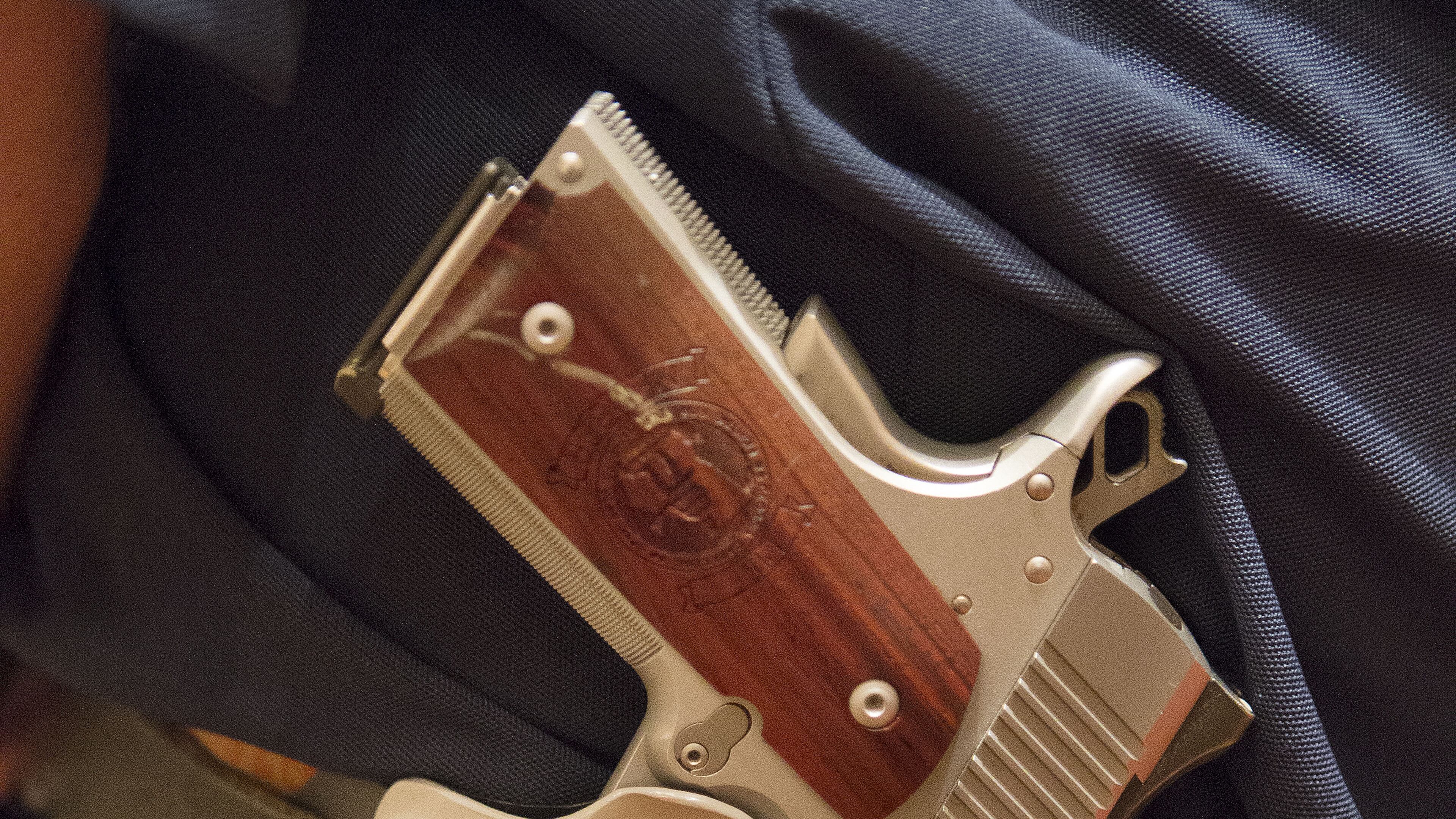 8/16/14-ATLANTA: Bruce Greenfield carried his gun in a custom holster during the 6th Annual GeorgiaCarry.org convention at the Renaissance Atlanta Waverly Hotel in Atlanta on Saturday August 16th, 2014. Second Amendment supporters celebrated Georgian's right to bear arms which has been expanded after the passage of HB60, a bill that gained international attention. (Photo by Phil Skinner / For the AJC) Gun owners lost an appeal to the Georgia Supreme Court today regarding guns in school zones. (AJC Photo)