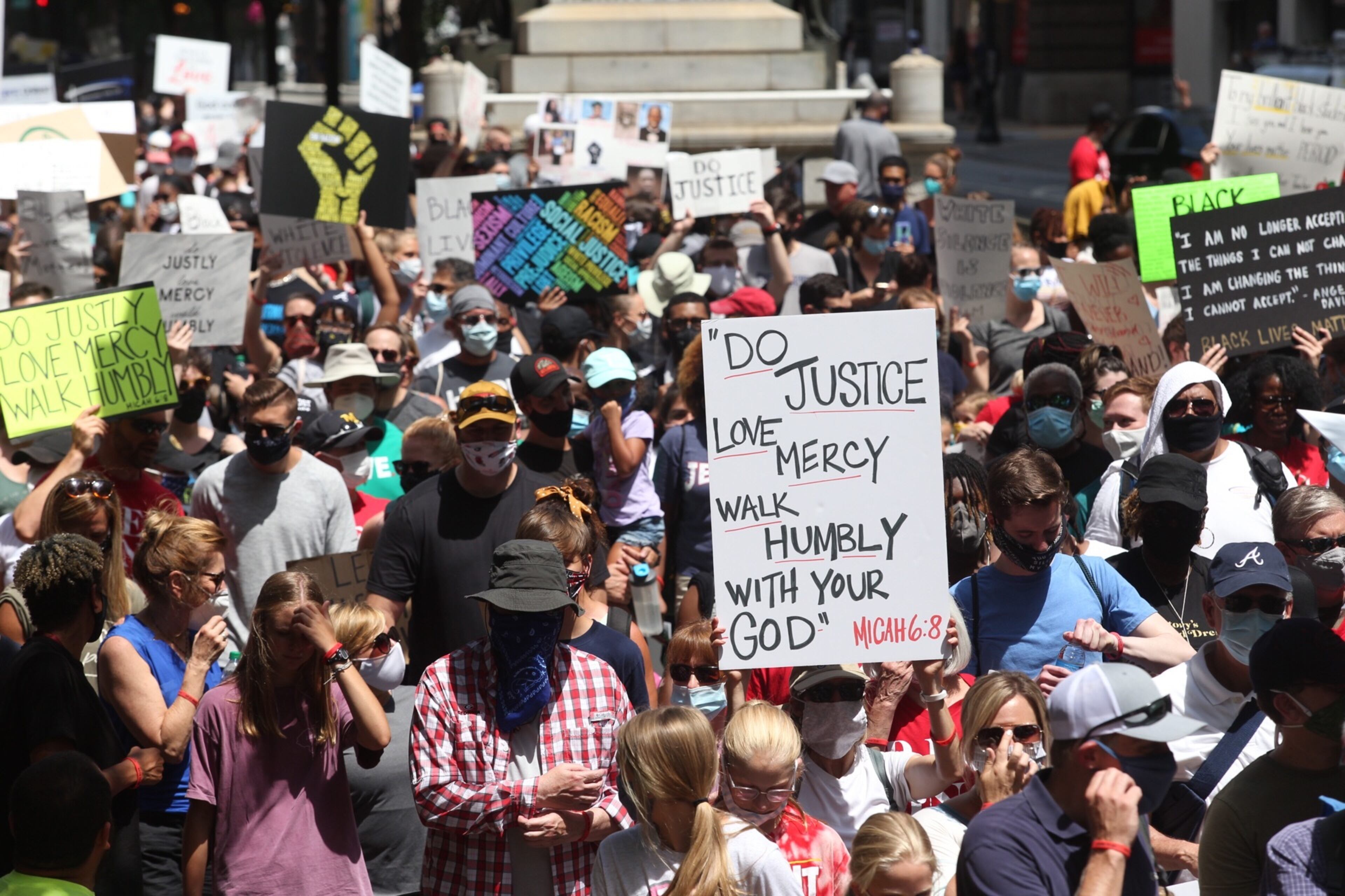 Crowds from OneRace’s “March on Atlanta” Juneteenth observance which kicked off at Centennial Olympic Park rallies for racial justice and equality at the state Capitol on Friday, June 19, 2020.