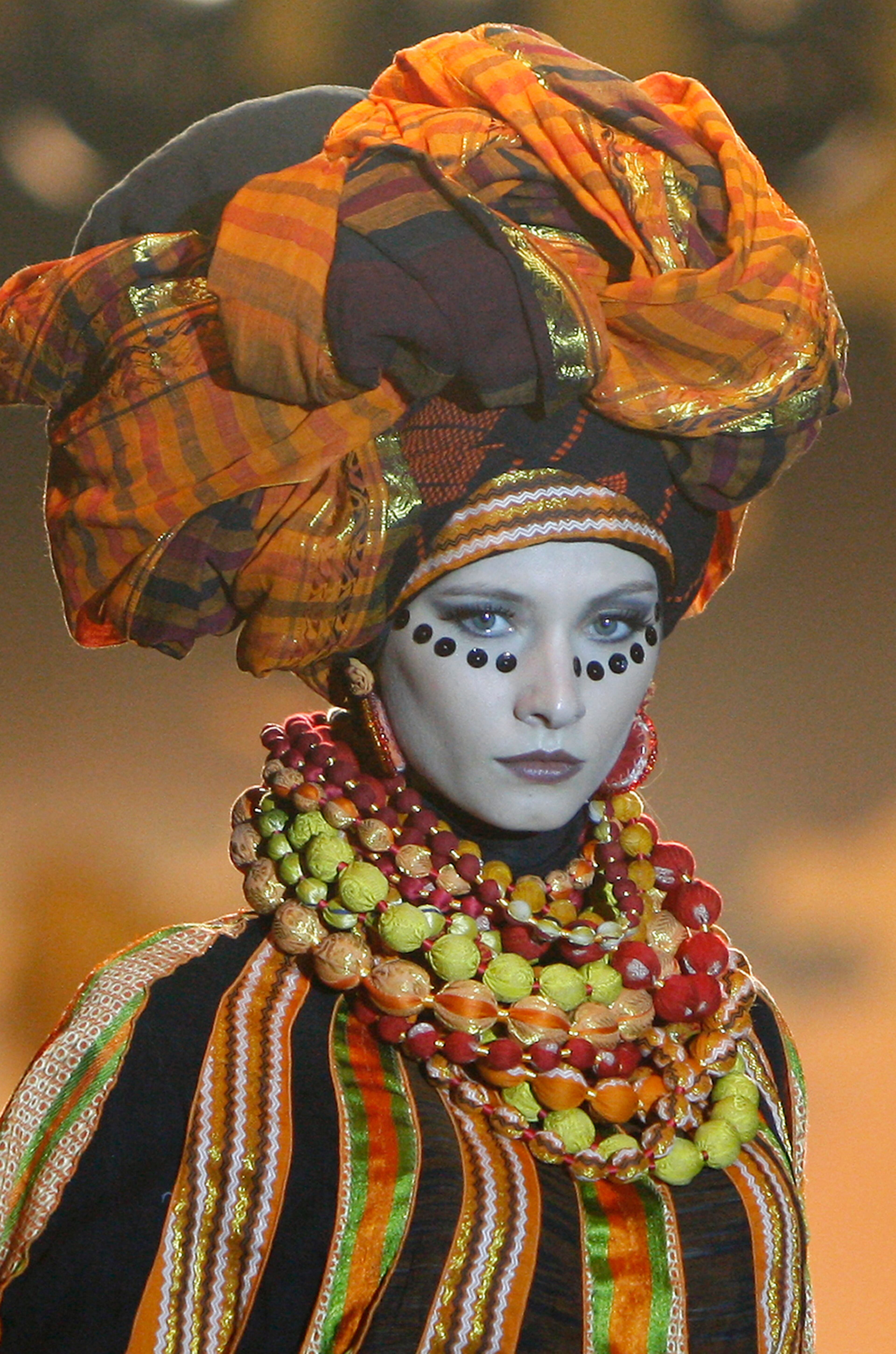 A model presents a creation by designer Paul Robb from Indonesia during the Islamic Fashion Festival in Kuala Lumpur, Malaysia, Monday, Nov. 5, 2012.