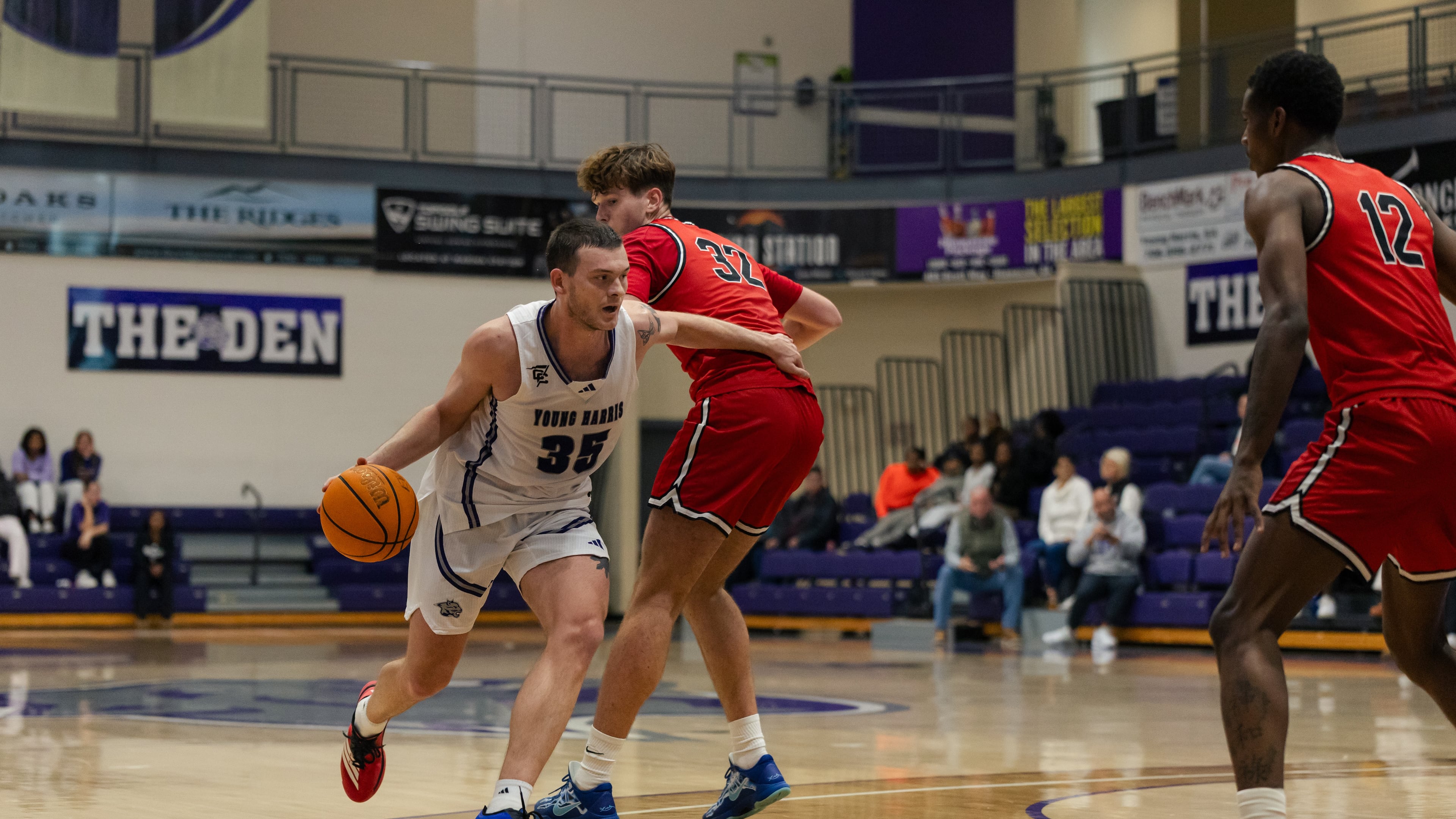 Carl Cleveland (left), a senior at Young Harris College, is the school’s all-time leading scorer. His inside-outside game makes him a tough player to defend. (Courtesy of Curtis Markham)