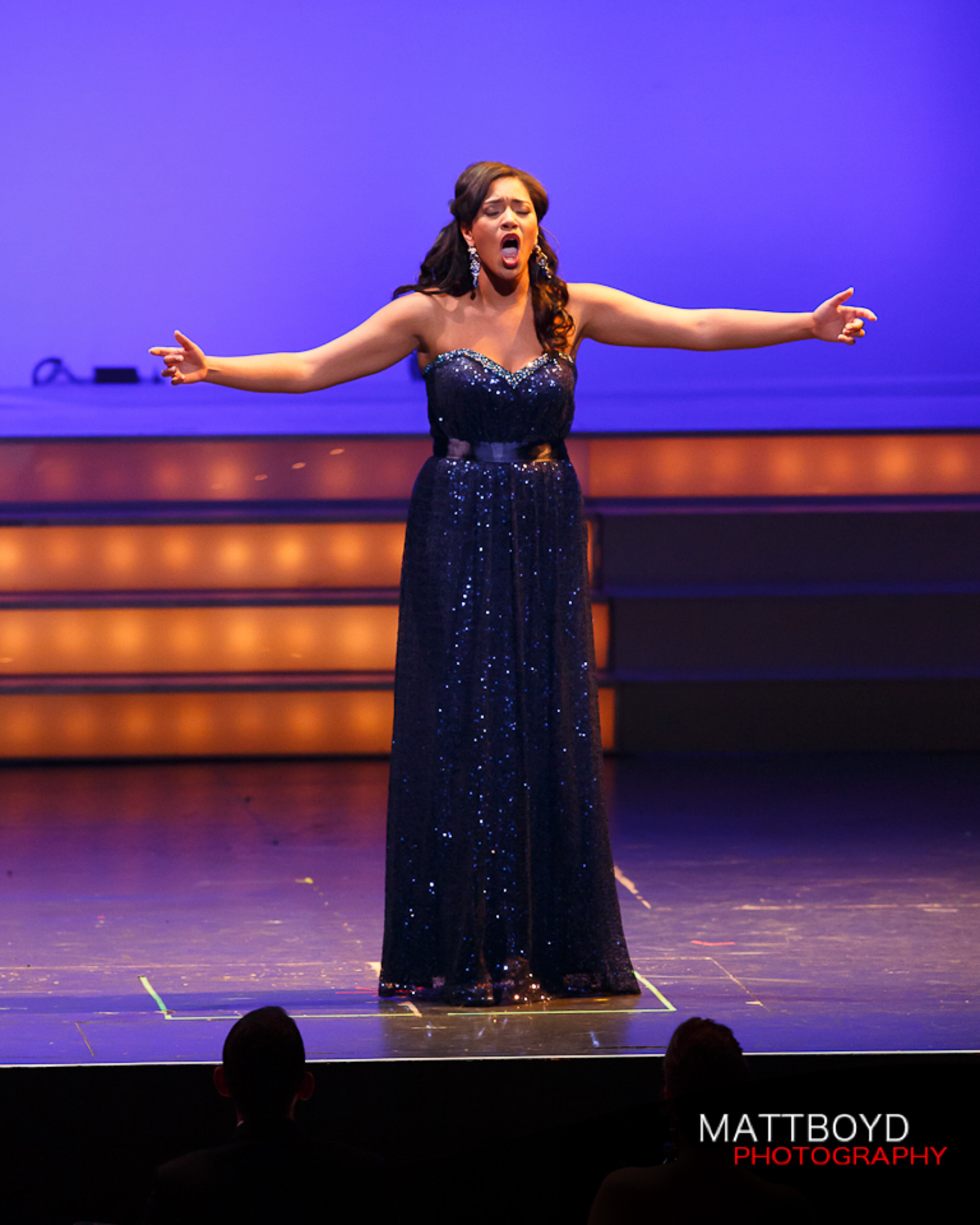 Olivia McMillian performs before she was named Miss Georgia's Outstanding Teen for 2014.