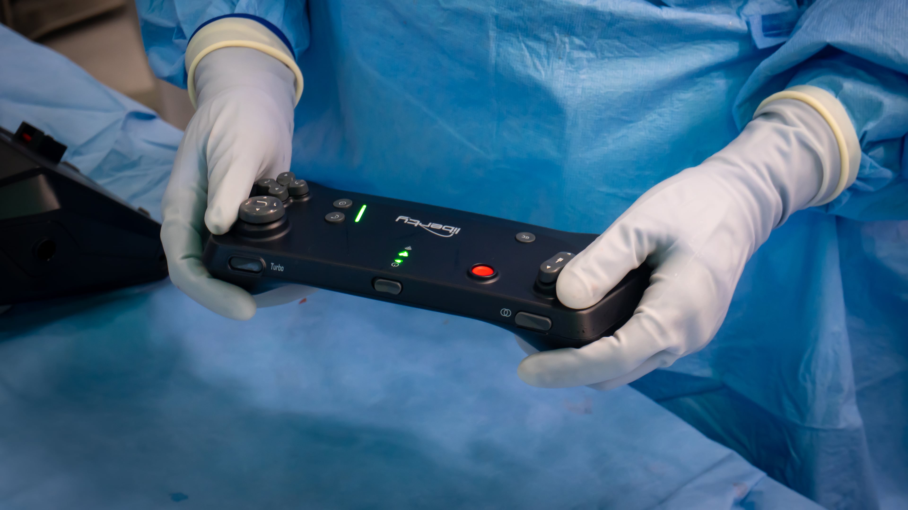 Emory interventional radiologists use a controller to treat medical conditions that looks like a videogame operator. (Courtesy of Winship Cancer Institute of Emory University)