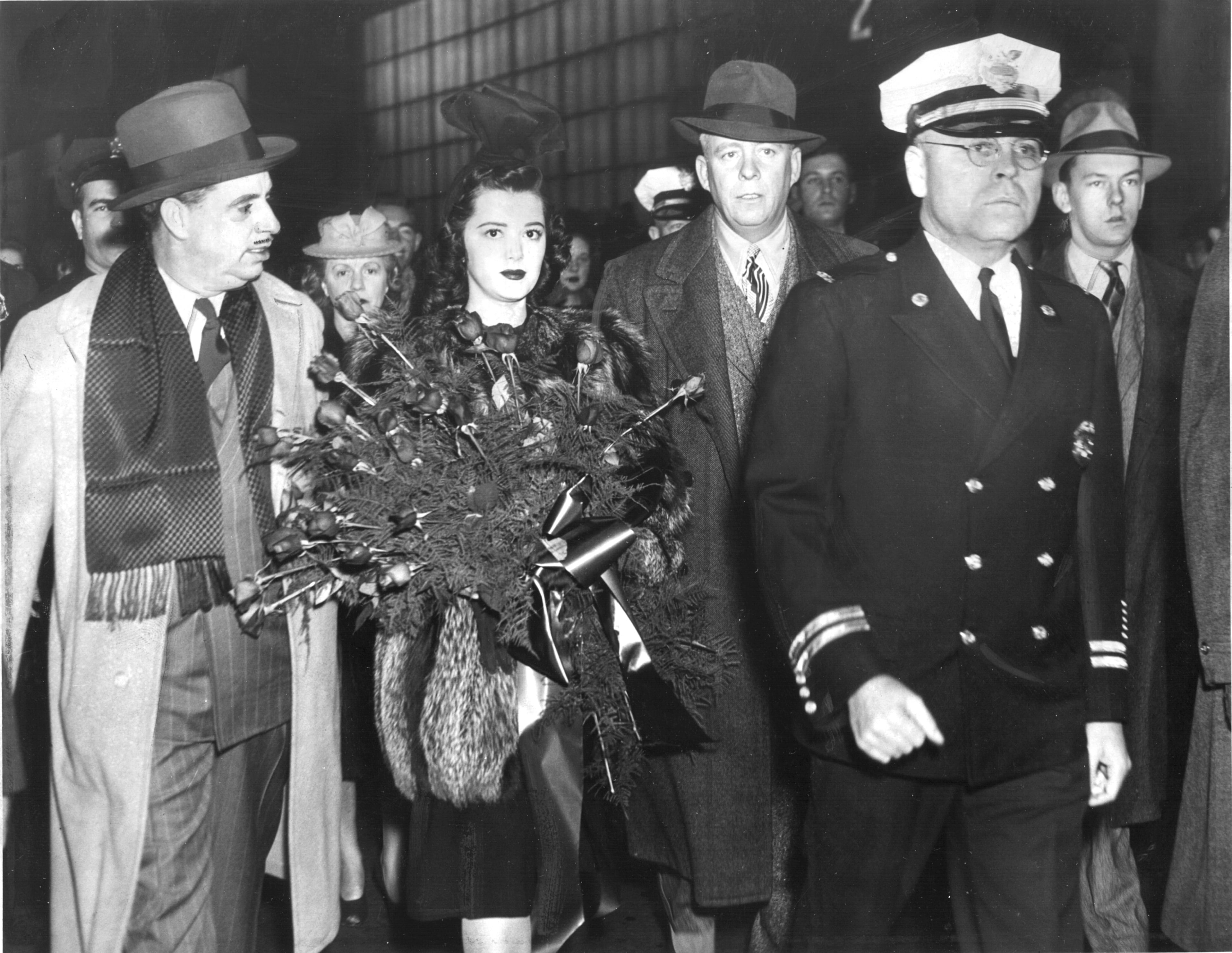 Marion A. Hornsby was elected Atlanta's police chief in February 1937, serving in the position until his death in 1947. Here, Hornsby (at right) escorts Mike Benton (far left) and actress Ann Rutherford as they make their way into the 1939 Atlanta premiere of "Gone With The Wind." Rutherford played Scarlett O'Hara's younger sister, Carreen, in the film.