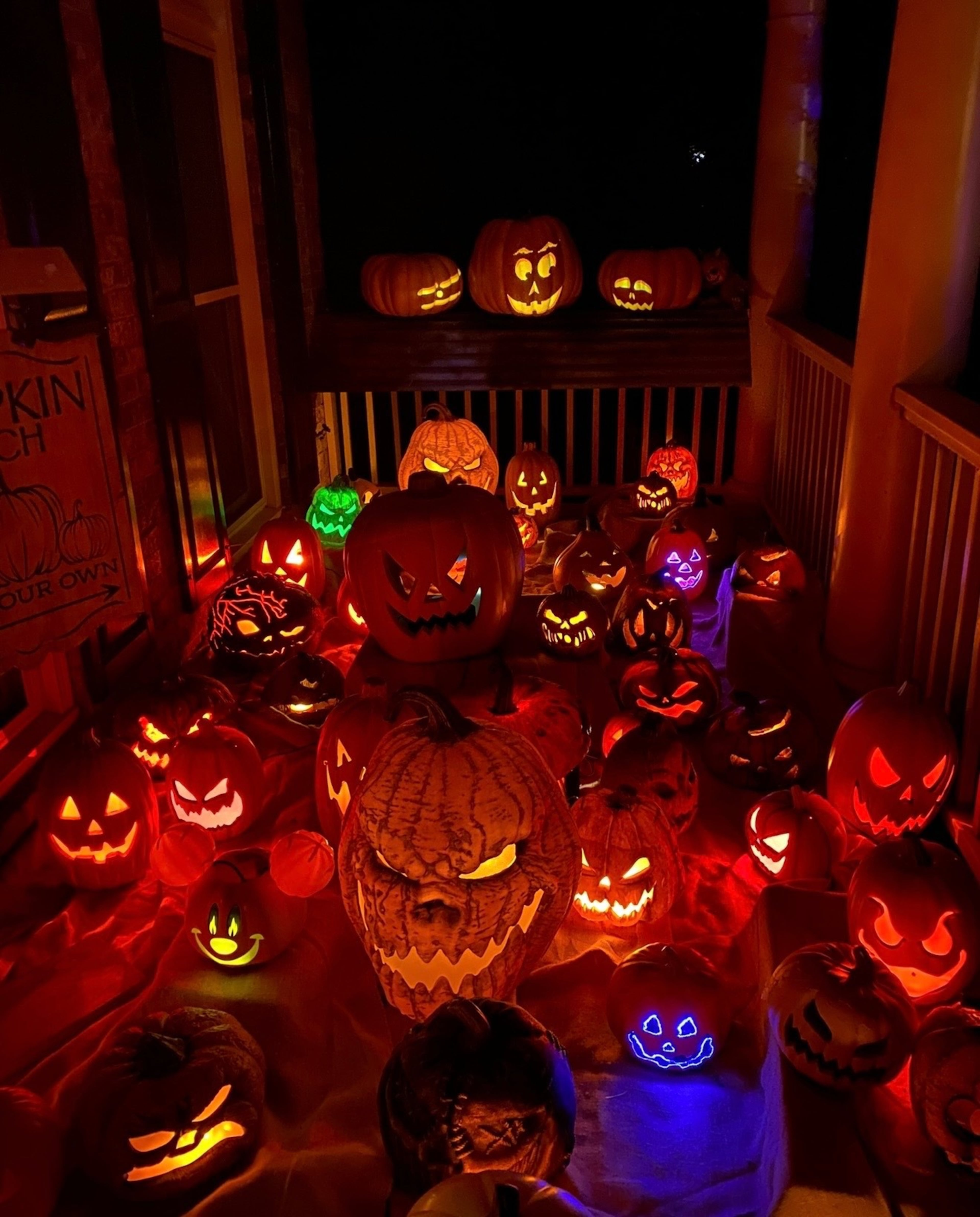The pumpkins that greet guests on the front porch illuminate this year’s “House of the Unhappy Pumpkins 14: The Final Chapter” theme. (Courtesy of the Cabrera Family Haunted House)