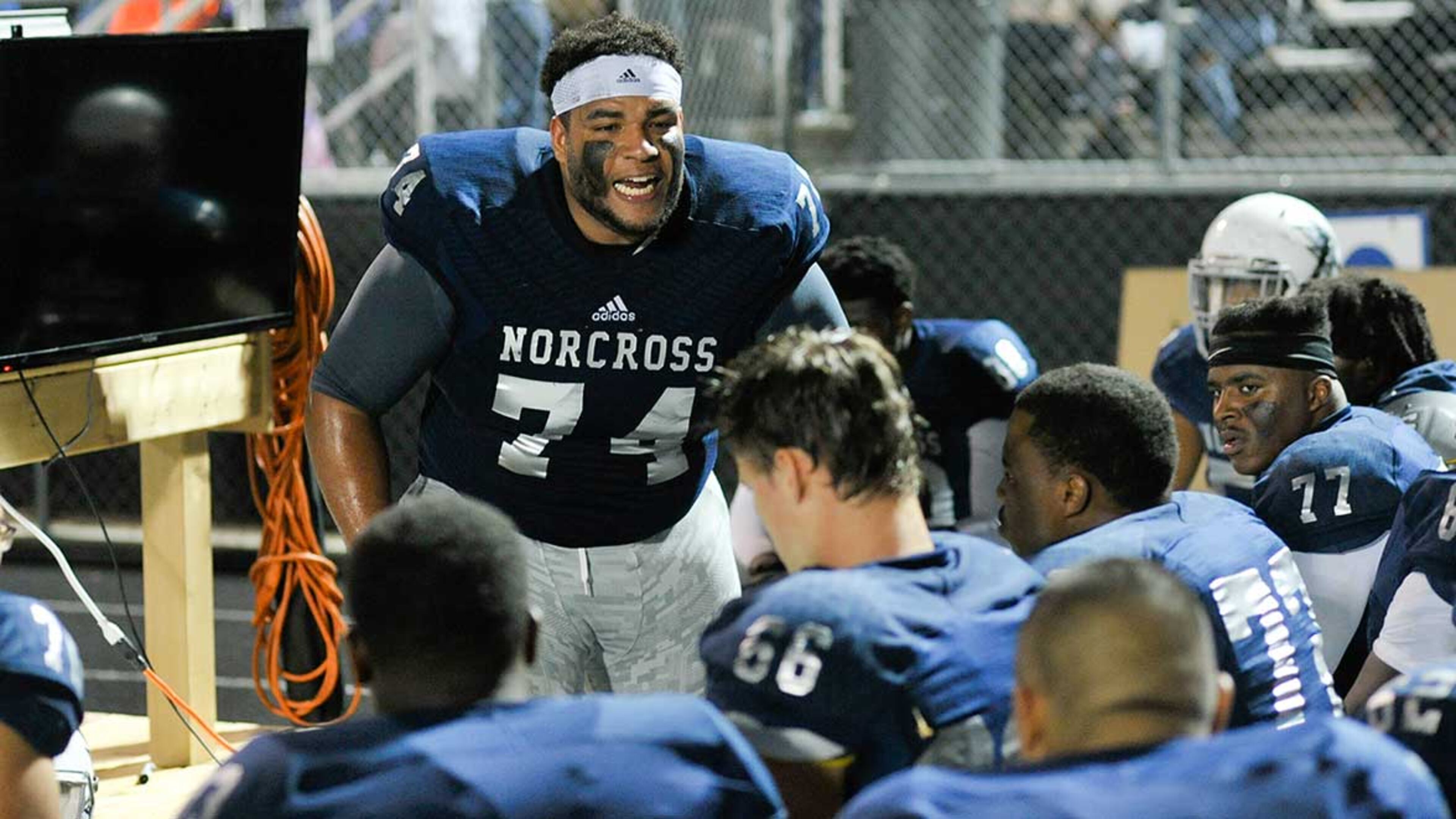 Norcross senior OL Devin Bennett motivates his teammates after a play in the second half of its home game against Brookwood Friday.