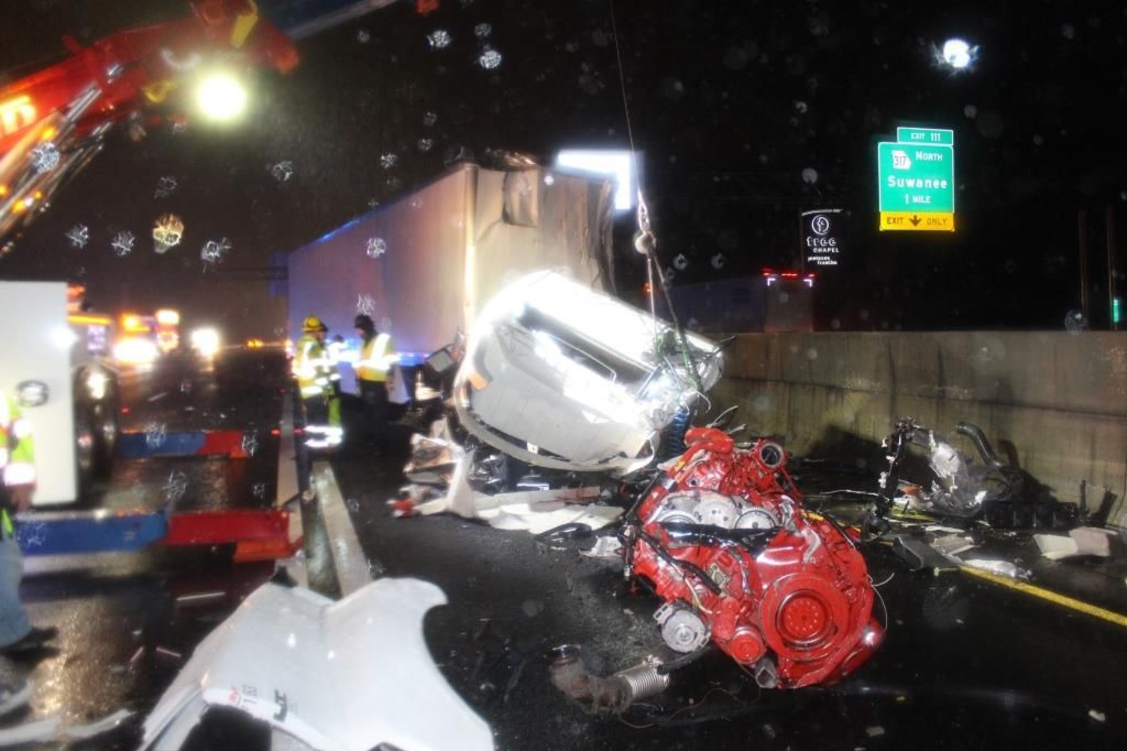 The drivers of two tractor-trailers were killed in Friday morning's crash, which shut down I-85 in Gwinnett County for hours.