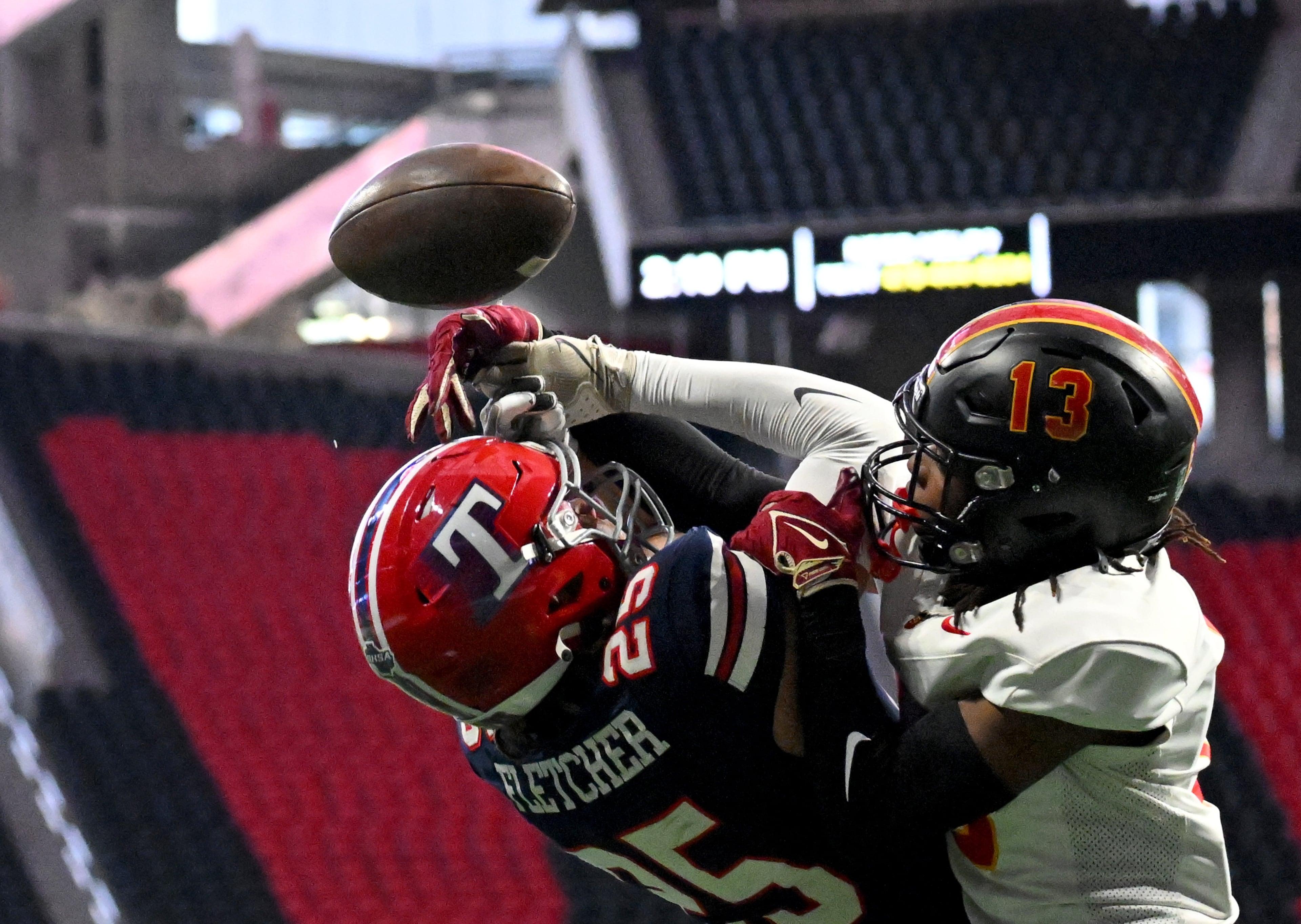 Toombs County's wide receiver Gavin Fletcher (25) is not able to catch under pressure from Northeast's free safety Keiland “juju” miley (13) during the first half in GHSA Class A-Division State Championship game at Mercedes-Benz Stadium, Tuesday, December 17, 2024, in Atlanta. (Hyosub Shin / AJC)
