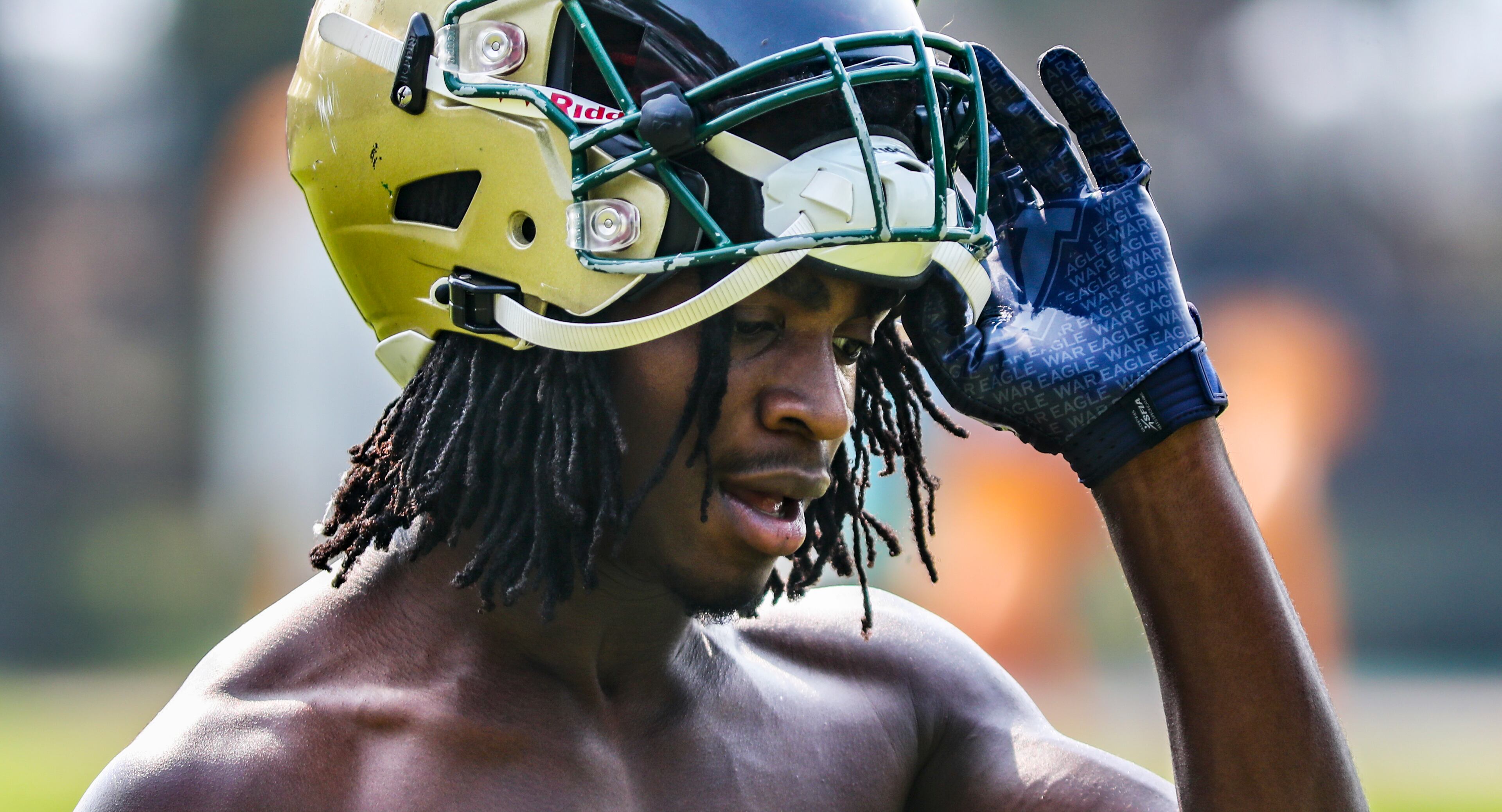 Joel Bradford trains Tuesday, July 18, 2023. on the field at Irwin and Jackson Streets behind Ebenezer Baptist Church in downtown Atlanta. Bradford will begin his freshman year with the Grayson High School football program soon. (John Spink / John.Spink@ajc.com)