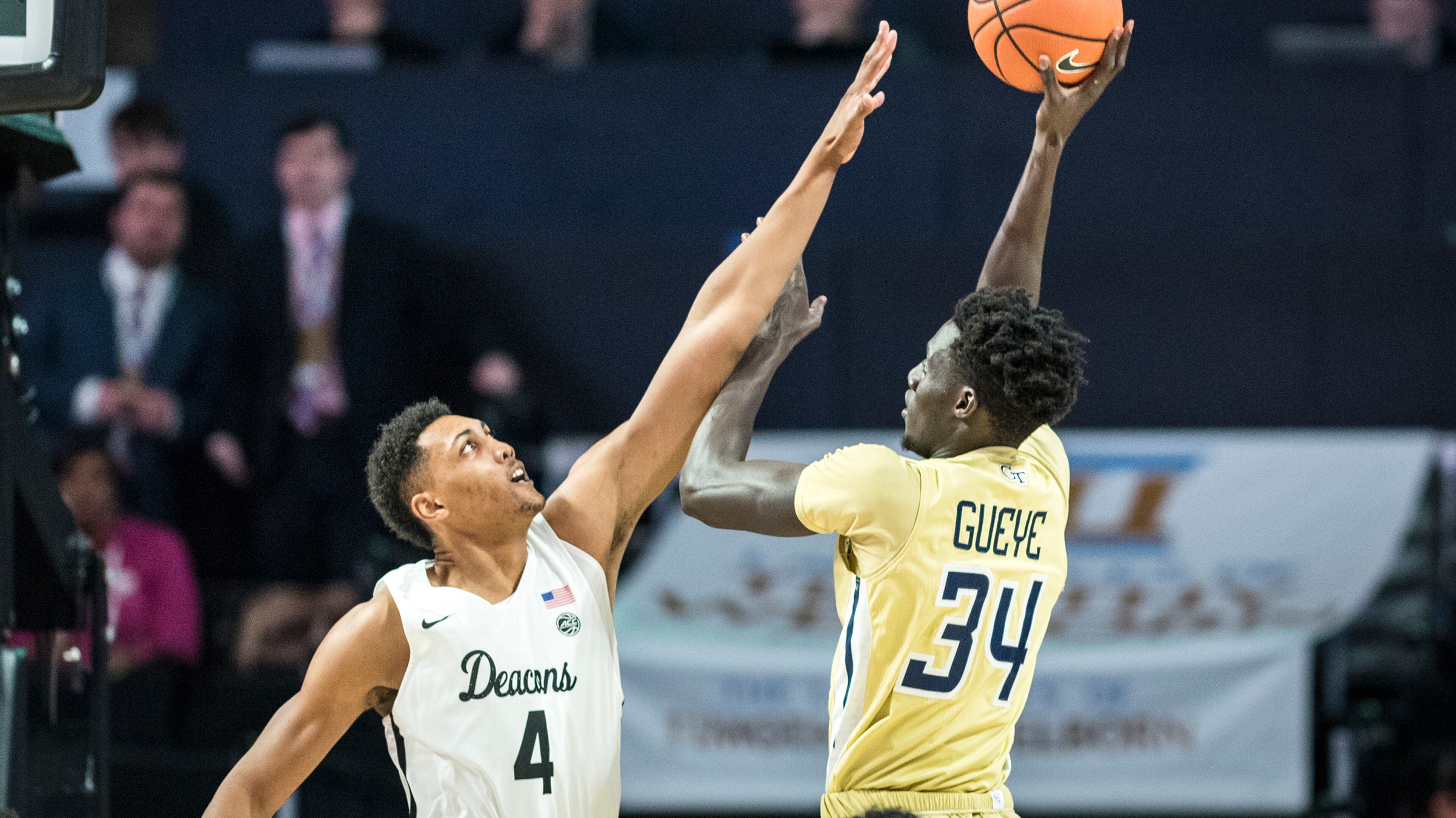 Georgia Tech forward Abdoulaye Gueye (34) shoots over defense from Wake Forest center Doral Moore (4) during an NCAA college basketball game, Wednesday, Feb. 14, 2018 in Winston-Salem, N.C. (Andrew Dye/The Winston-Salem Journal via AP)