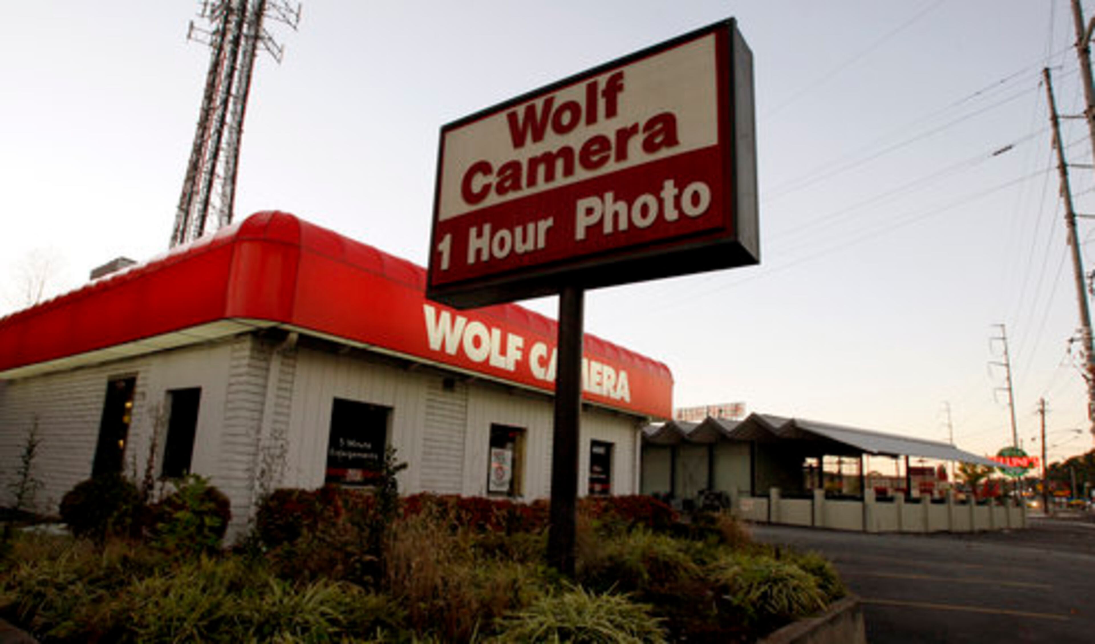 Smash-and-grab robbers hit Wolf Camera on Roswell Road in north Atlanta on Friday morning before 5 a.m.