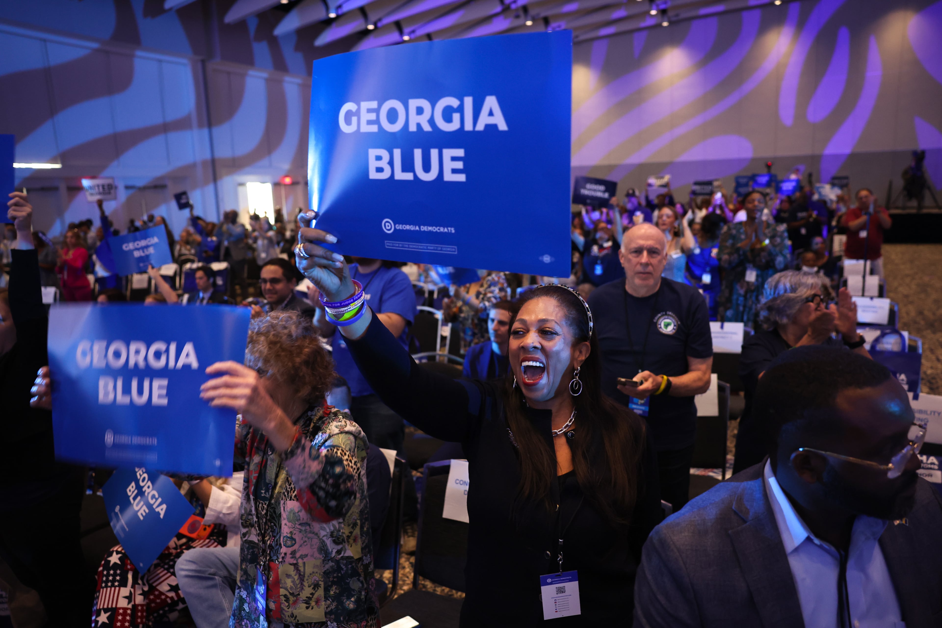 Cassandra Littlejohn cheers at the Georgia Democratic Convention at the Savannah Convention Center in Savannah on Saturday, Aug. 1, 2026. (Arvin Temkar/AJC)