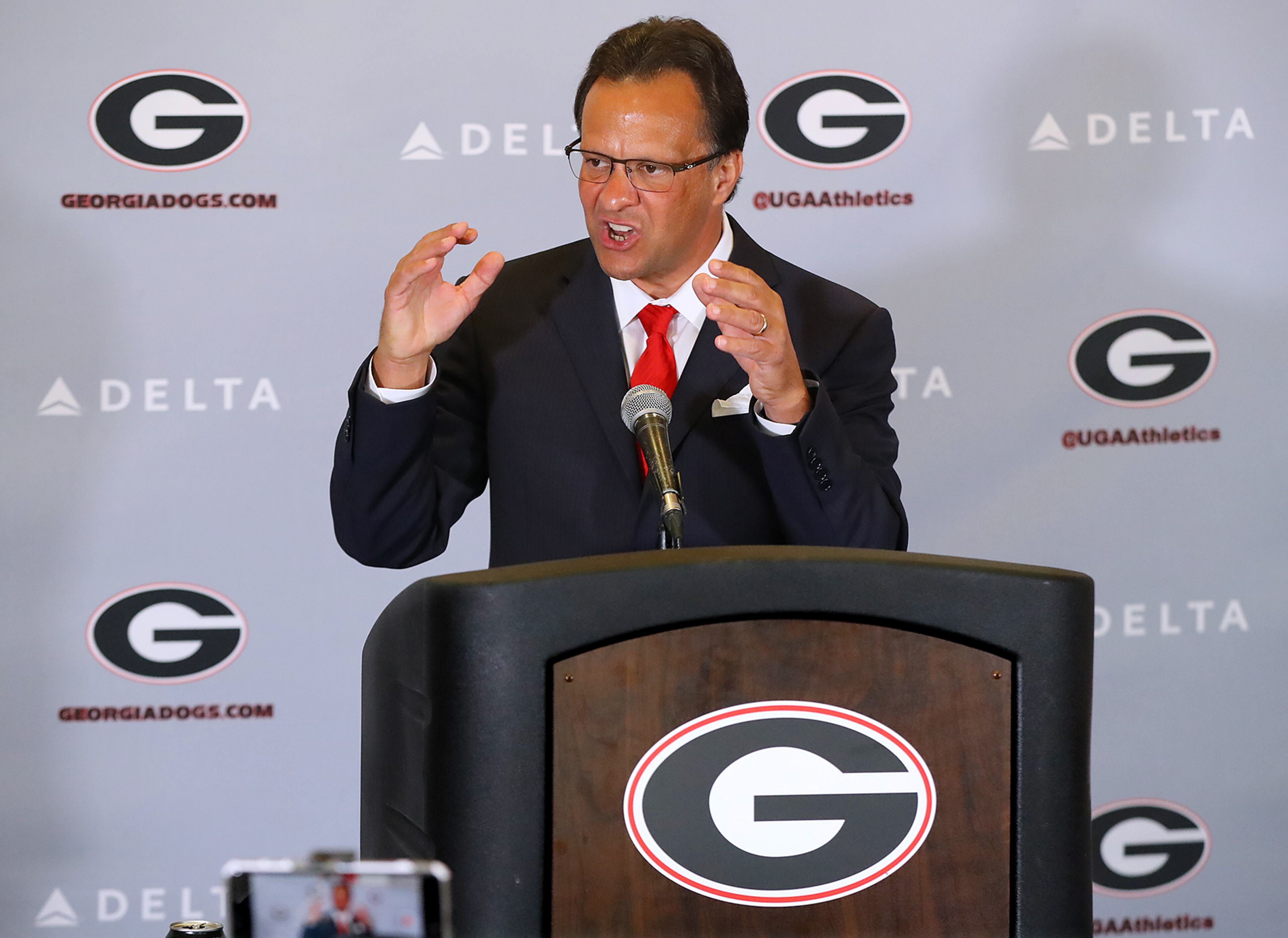 March 16, 2018 Athens: Tom Crean makes a passionate 27 minute opening statement as he is introduced as the new men's basketball head coach at the University of Georgia on Friday, March 16, 2018, at Stegeman Coliseum in Athens. Crean compiled a 356-231 record in 18 seasons at Marquette and Indiana from 1999-2017. Curtis Compton/ccompton@ajc.com