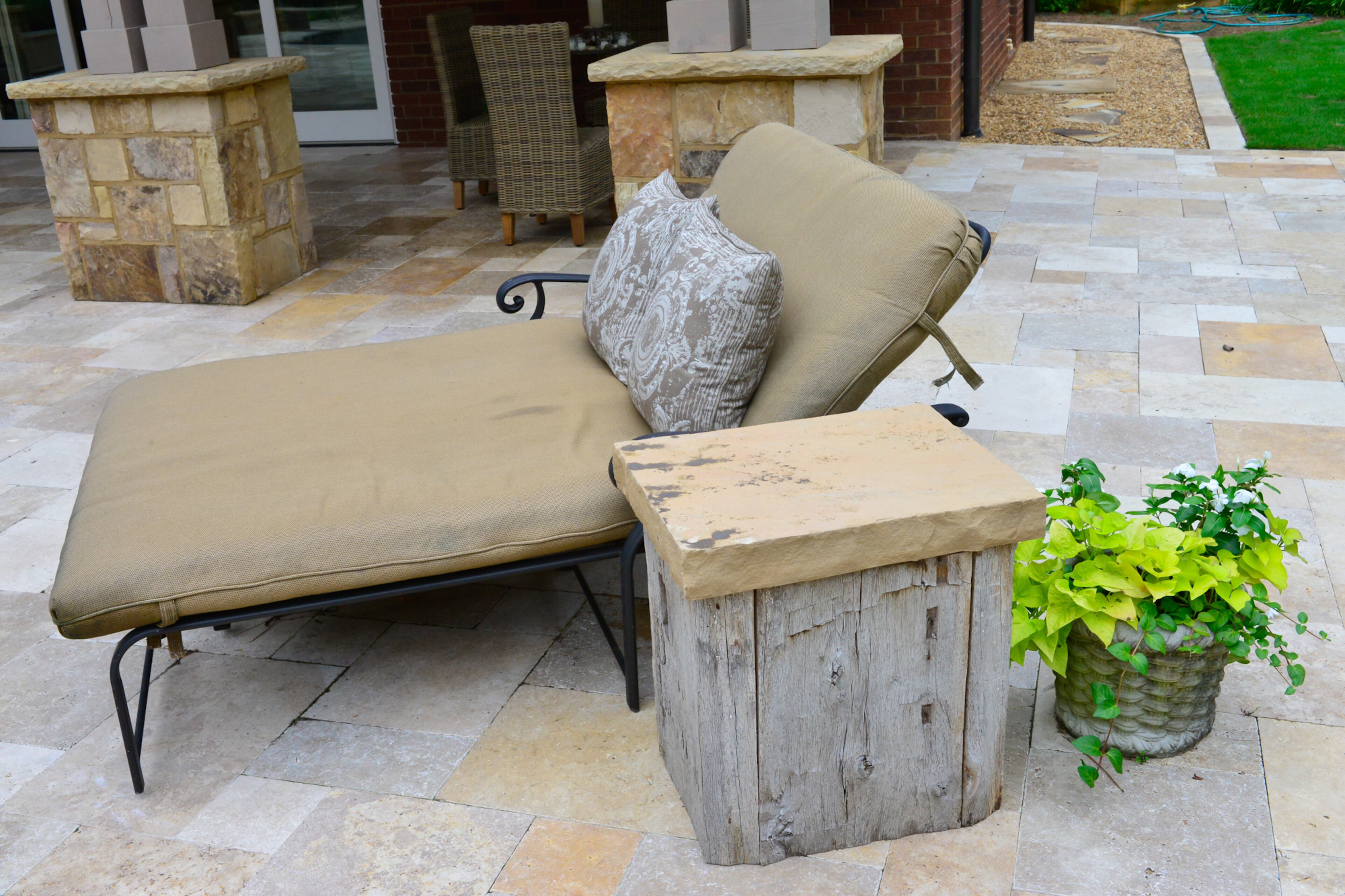 The chaise lounge by the pool was purchased several years ago from Georgia Backyard. -- Text by Lori Johnston