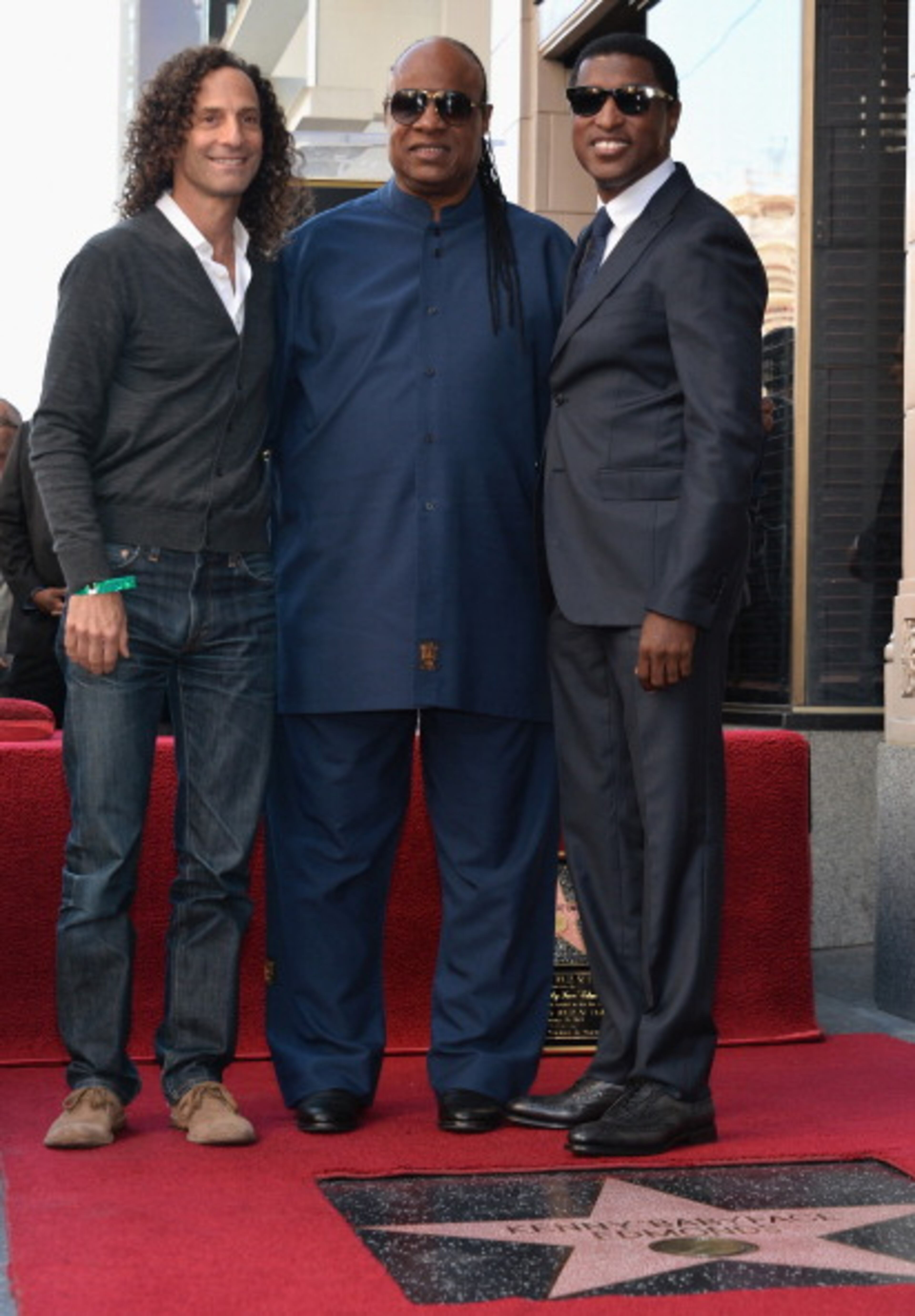 HOLLYWOOD, CA - OCTOBER 10: Musician Kenny G., singer Stevie Wonder and songwriter/record producer Kenny "Babyface" Edmonds attend a ceremony honoring Kenny "Babyface" Edmonds with the 2508th Star on the Hollywood Walk of Fame on October 10, 2013 in Hollywood, California. (Photo by Alberto E. Rodriguez/Getty Images)