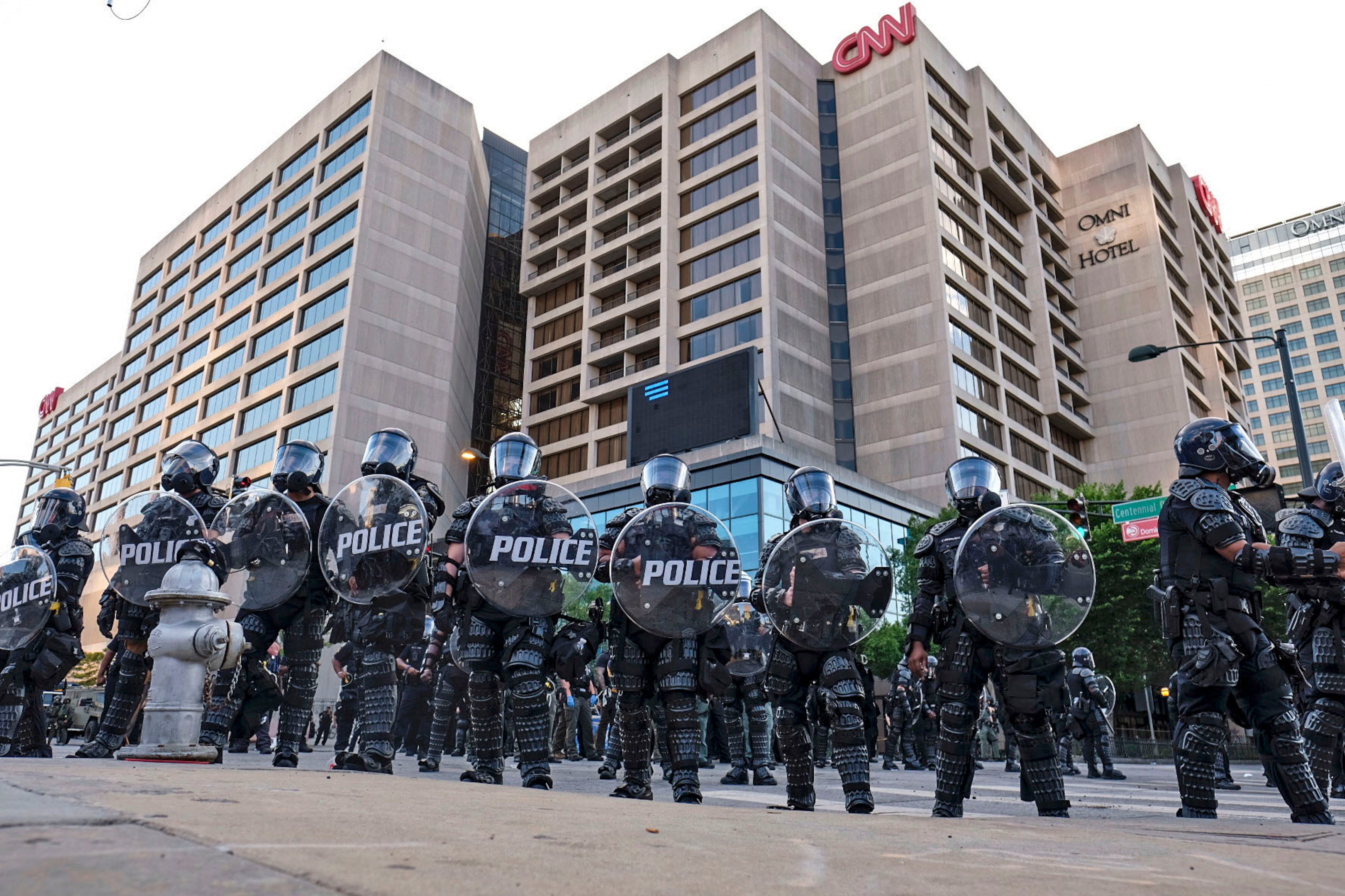 May 30, 2020 - Atlanta - There was a heavy police presence around the CNN Center and Centennial Olympic park as protests continued for a second day. Protests over the death of George Floyd in Minneapolis police custody spread around the United States on Saturday, as his case renewed anger about others involving African Americans, police and race relations. Ben Gray for the Atlanta Journal Constitution