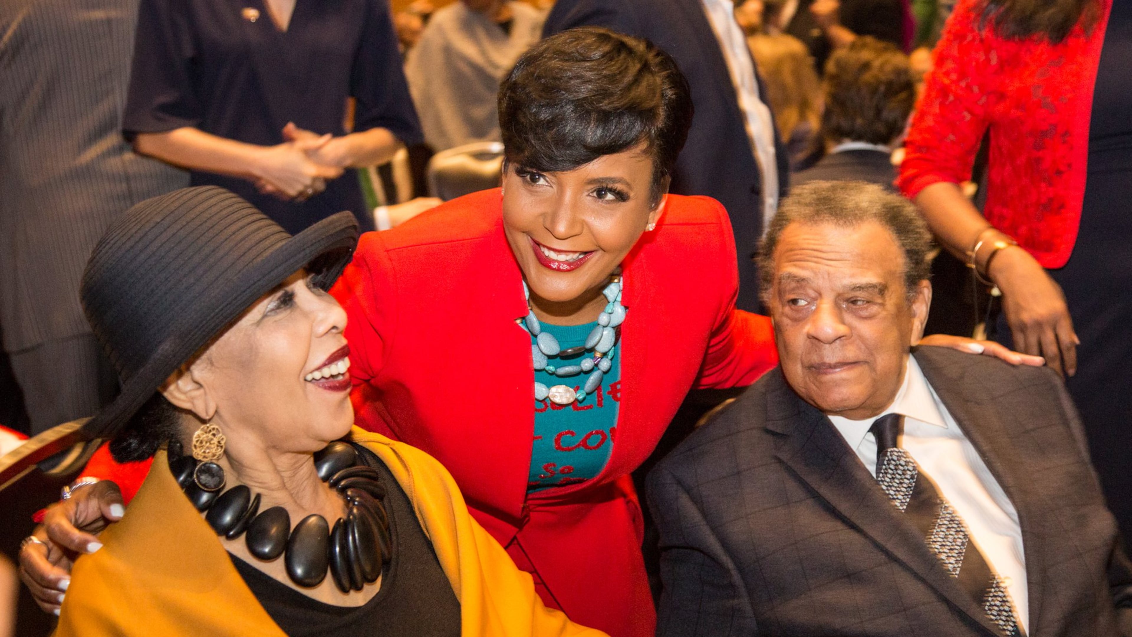 Keisha Lance Bottoms, Mayor of Atlanta (center) poses with Caroline Young and Ambassador Andrew Young at the State of the City Business Breakfast at the Georgia World Congress Center in Atlanta on Tuesday. (Photo by Phil Skinner)