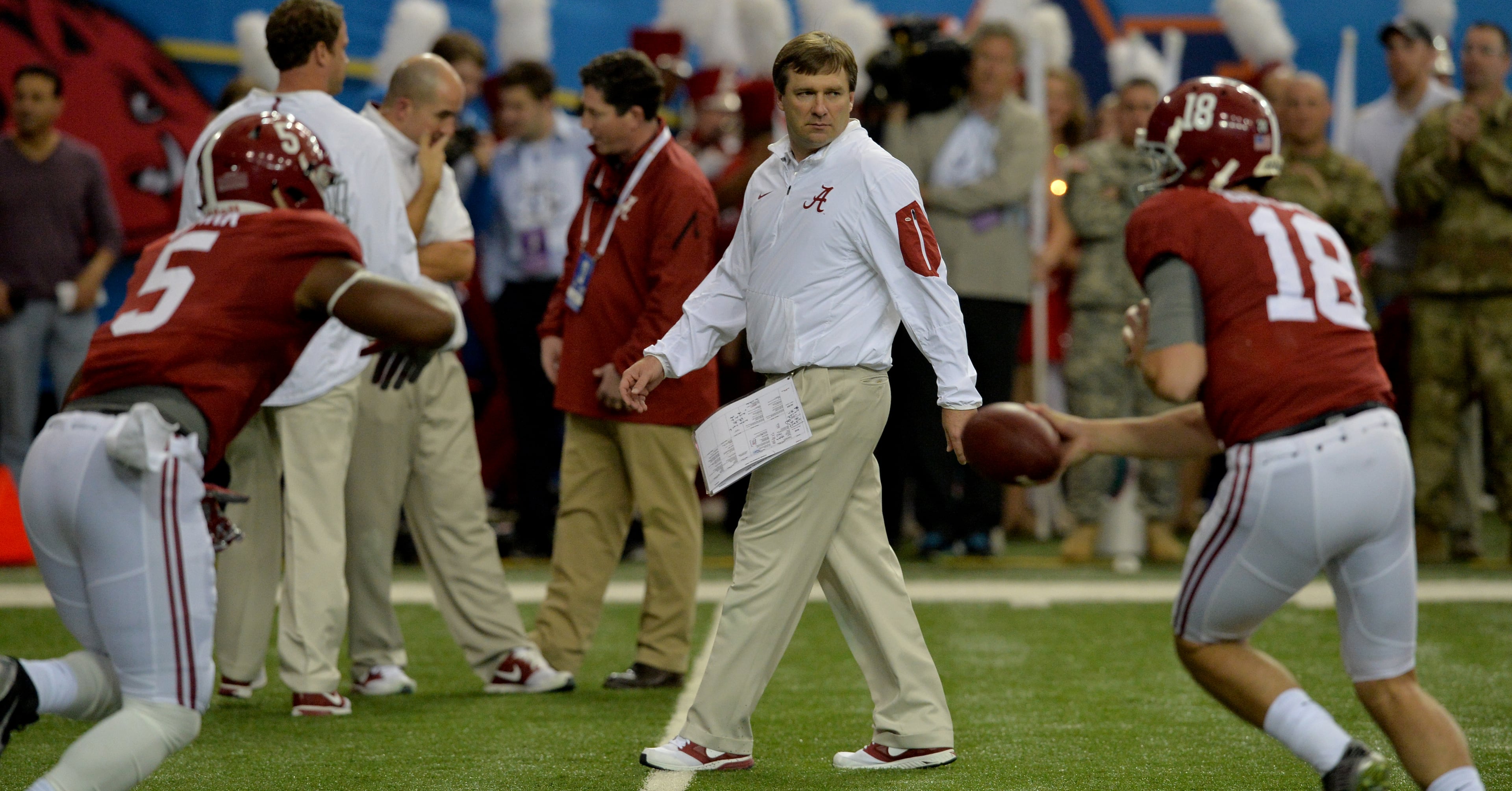 Alabama Crimson Tide defensive coordinator and soon to be Georgia head coach, Kirby Smart , watches warm-ups before taking on Florida in the SEC Championship at the Georgia Dome Saturday December 5, 2015. BRANT SANDERLIN/BSANDERLIN@AJC.COM