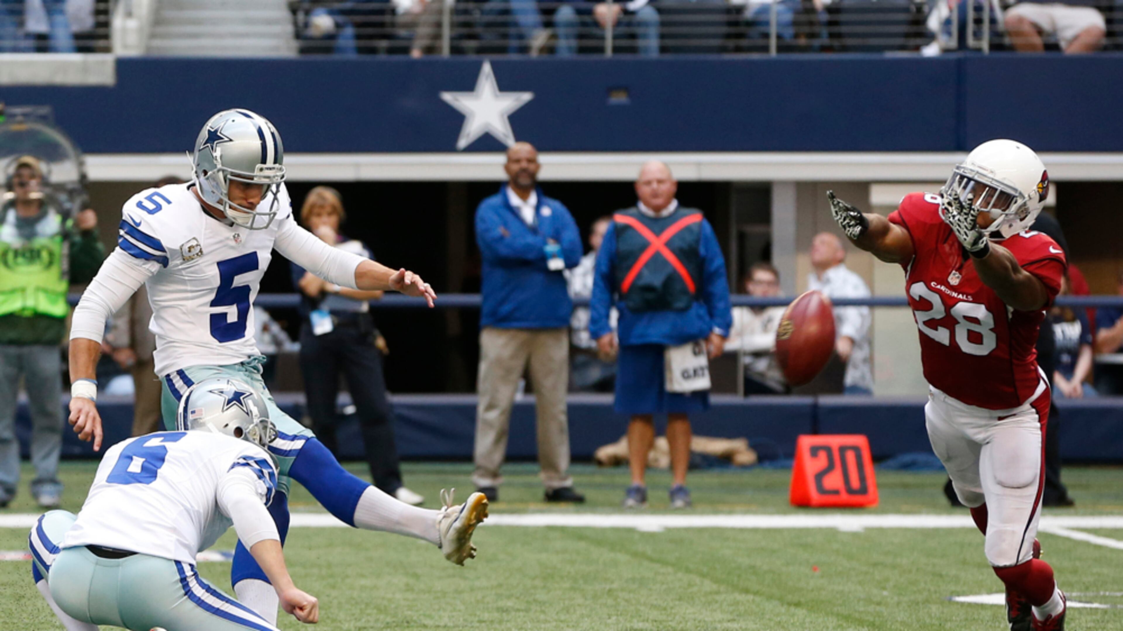 Arizona Cardinals cornerback Justin Bethel (28) blocks a field goal attempt by Dallas Cowboys kicker Dan Bailey (5) during the first half of an NFL football game Sunday, Nov. 2, 2014, in Arlington, Texas. (AP Photo/Sue Ogrocki)