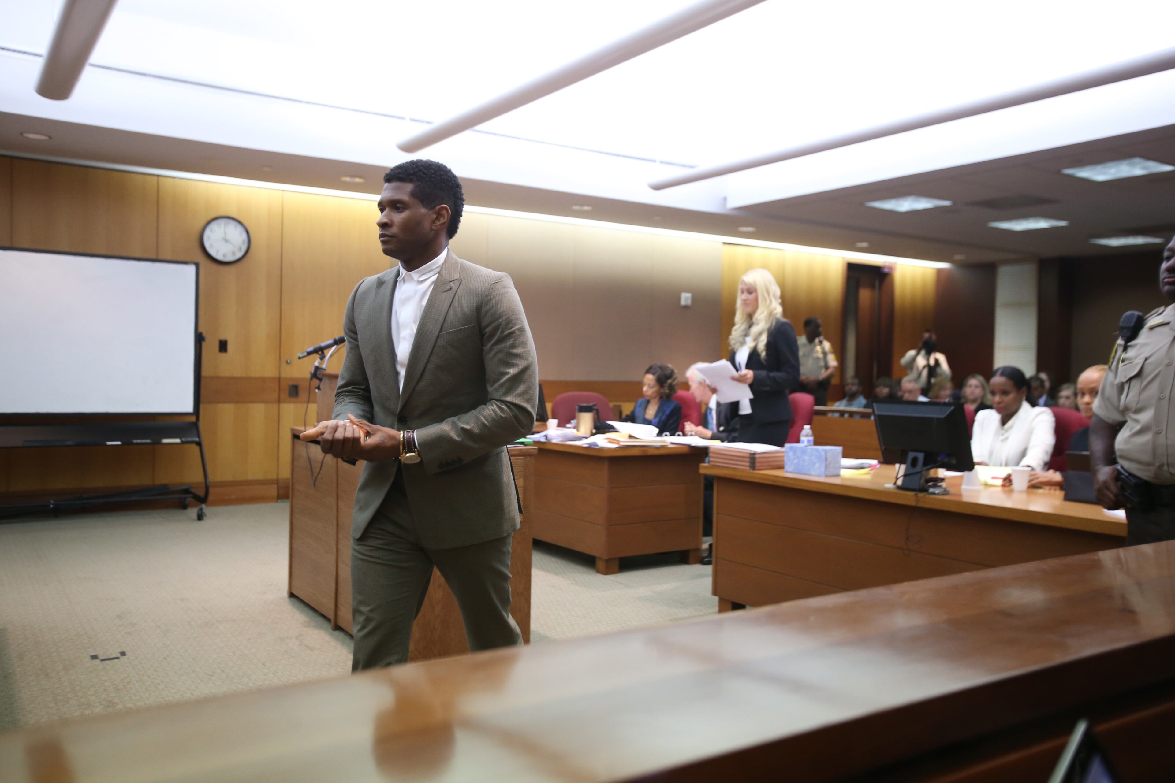 Usher takes the stand in court Friday, Aug. 9, 2013.