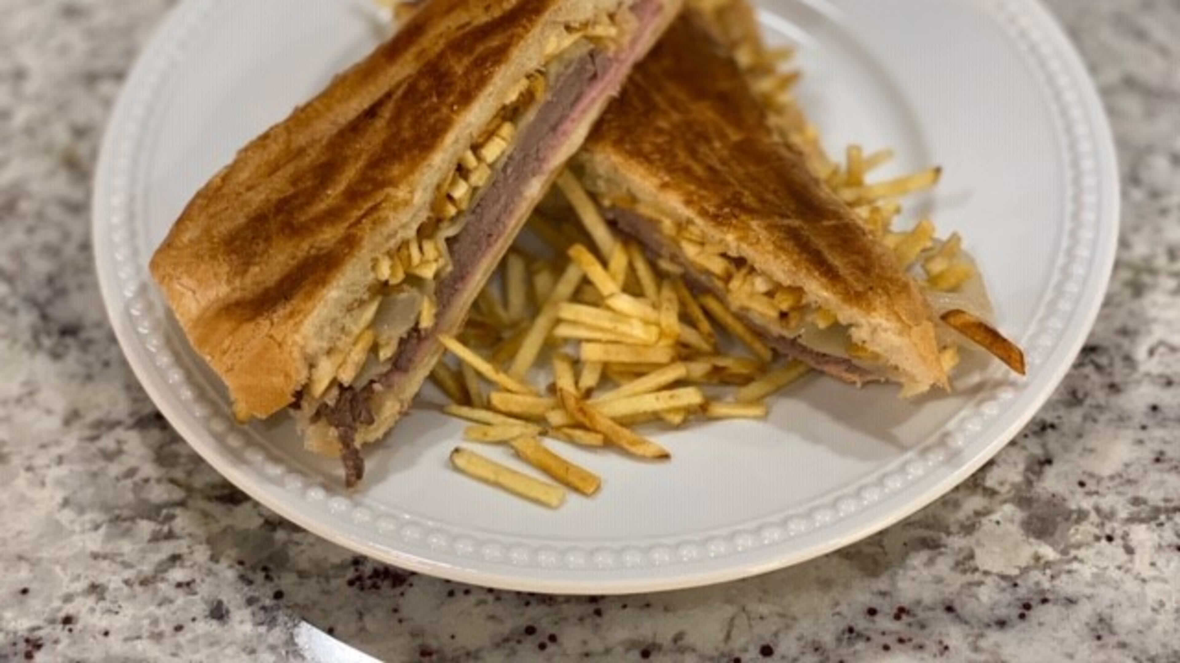A sandwich from the menu of Cubanos ATL.
