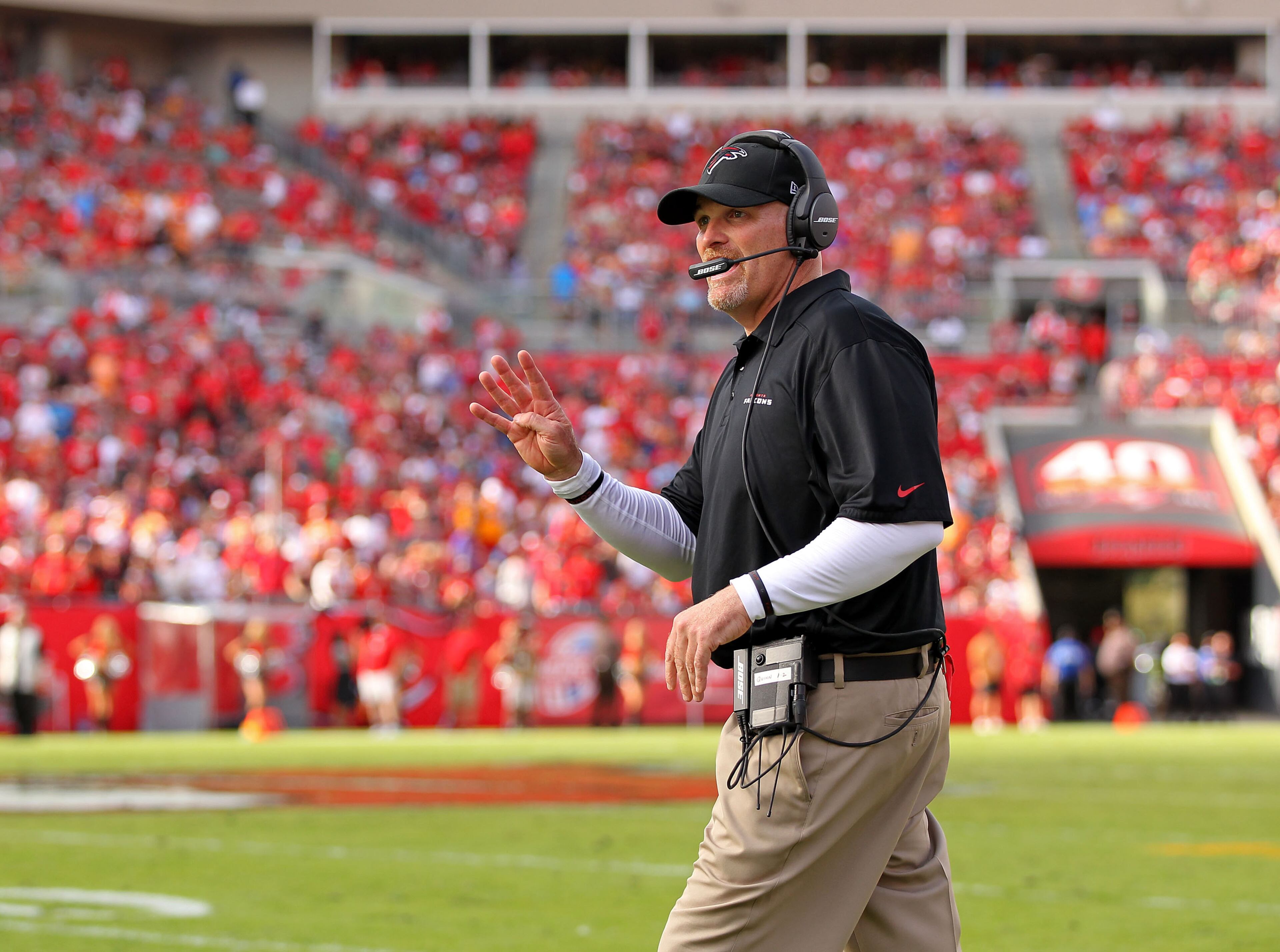 TAMPA, FL - DECEMBER 06: Head coach Dan Quinn of the Atlanta Falcons signals during the game against the Tampa Bay Buccaneers at Raymond James Stadium on December 6, 2015 in Tampa, Florida. (Photo by Rob Foldy/Getty Images)