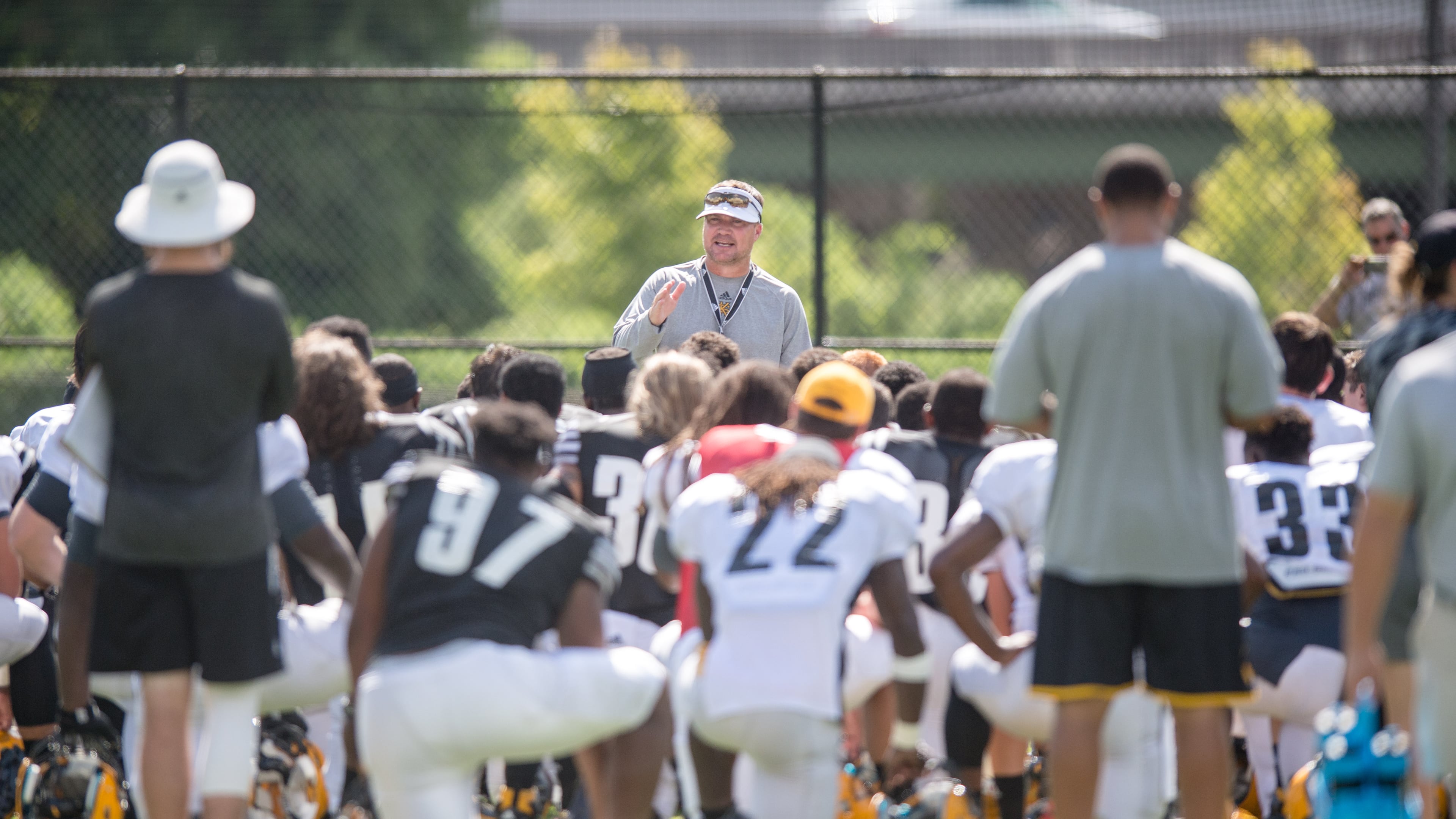 Kennesaw State coach Brian Bohannon speaks with his team. (Photo courtesy of KSU Sports Information)